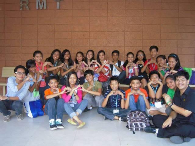 Domingo (bottom right) poses with his advisory class. As an active Pathways volunteer, Domingo gets to mentor younger children.