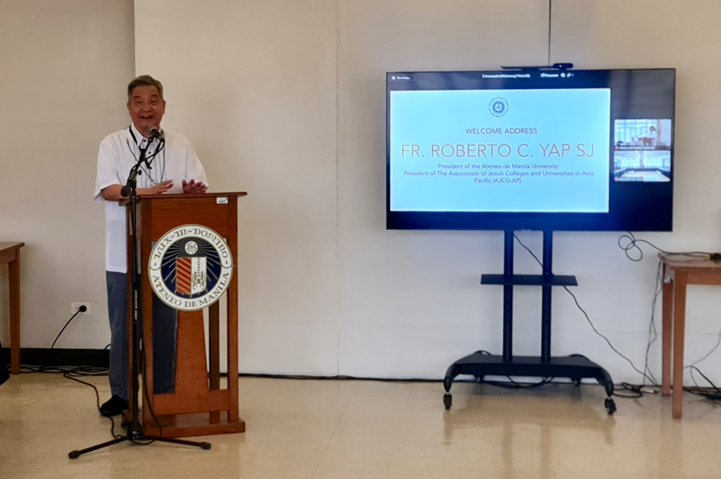 Fr. Yap gives the welcome remarks and formally begins the meeting.