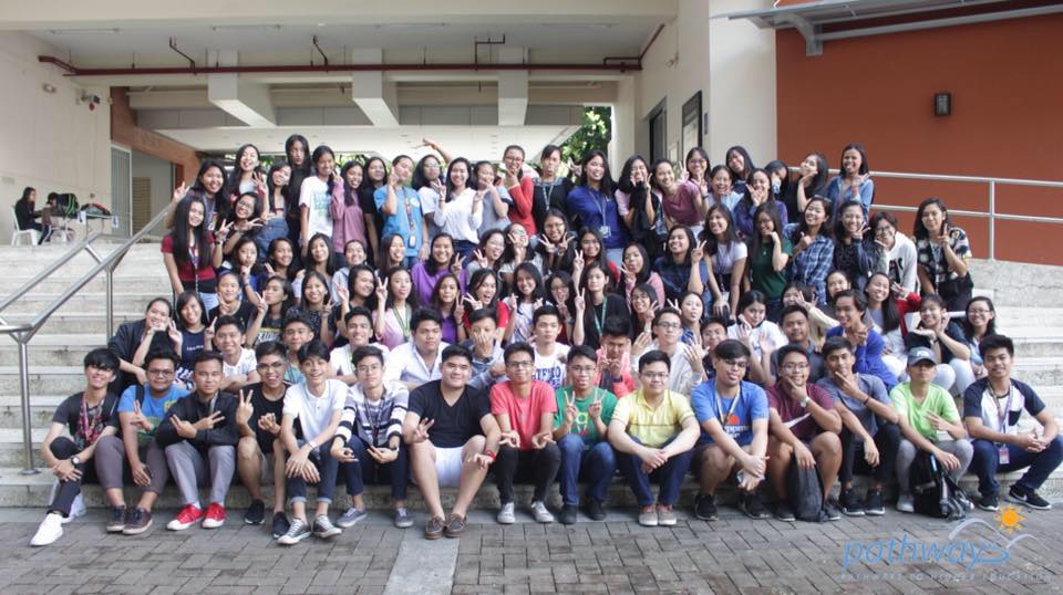 A rather pixelated and dated photo of the same group of students lining the steps of Leong Hall.