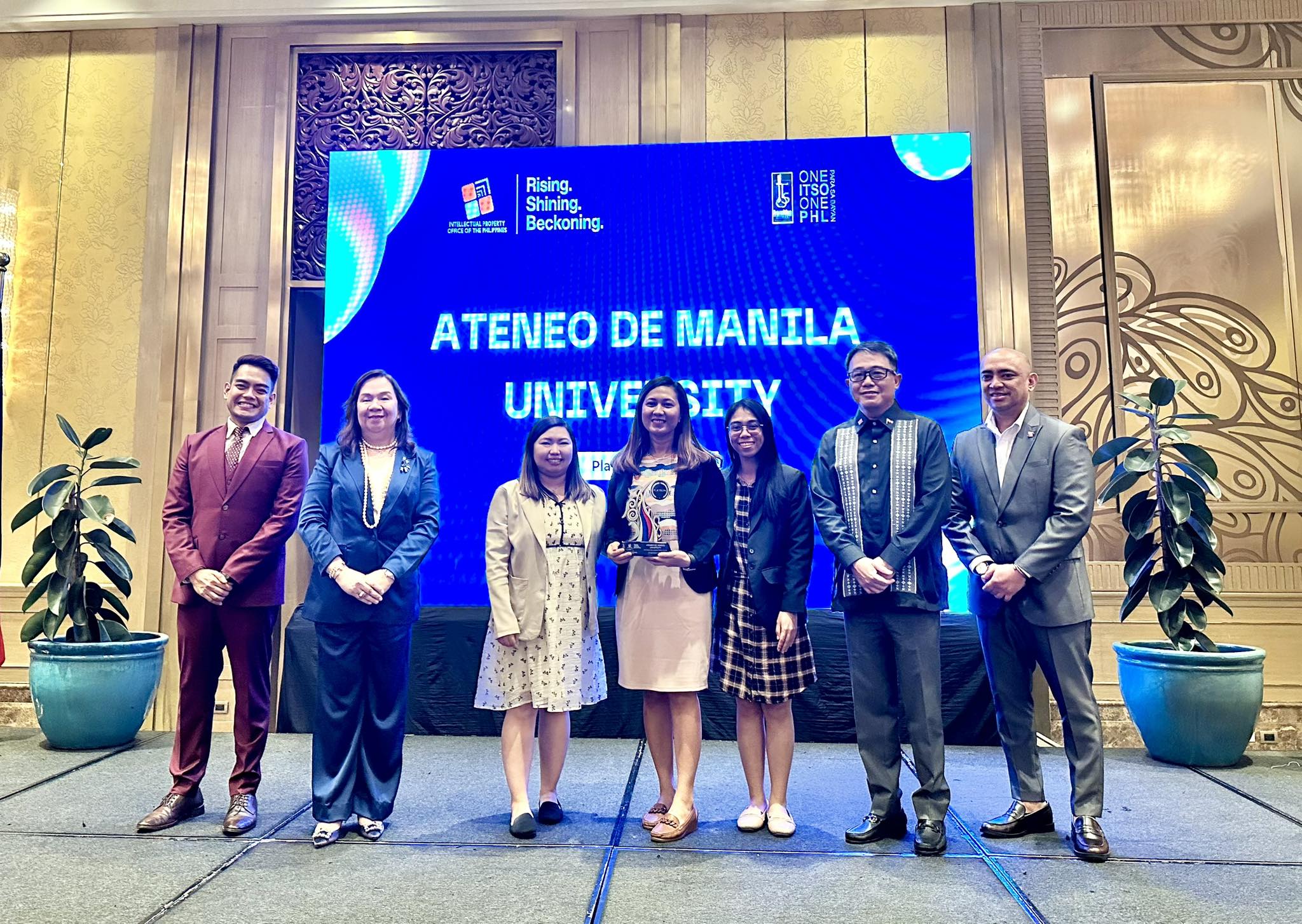 AIPO receiving the award