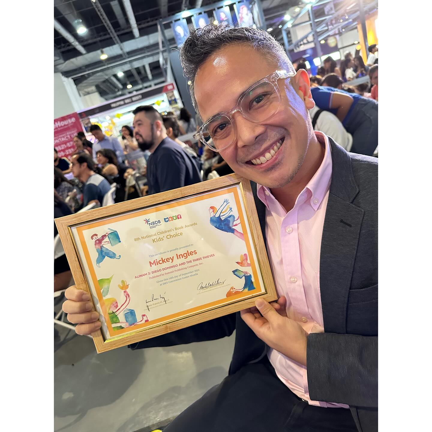 Atty Mickey with his certificate of recognition for Alinam Dos’ Kids Choice Award citation