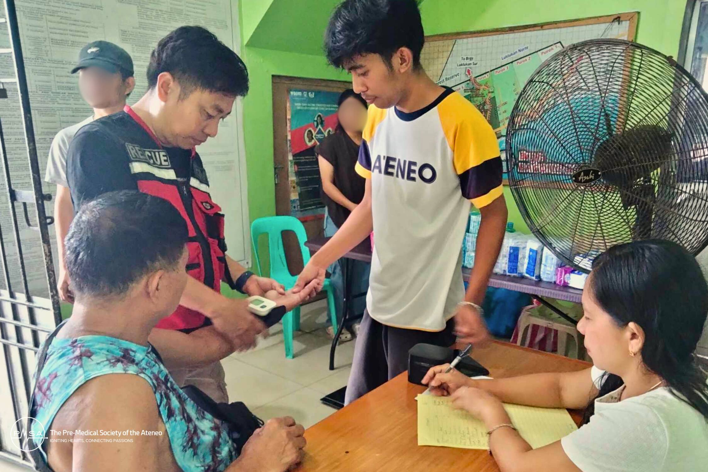 Photo 3. Volunteers and volunteer health workers affiliated with AdNU and CYA-AdNU held general consultations during the relief response in Camarines Norte
