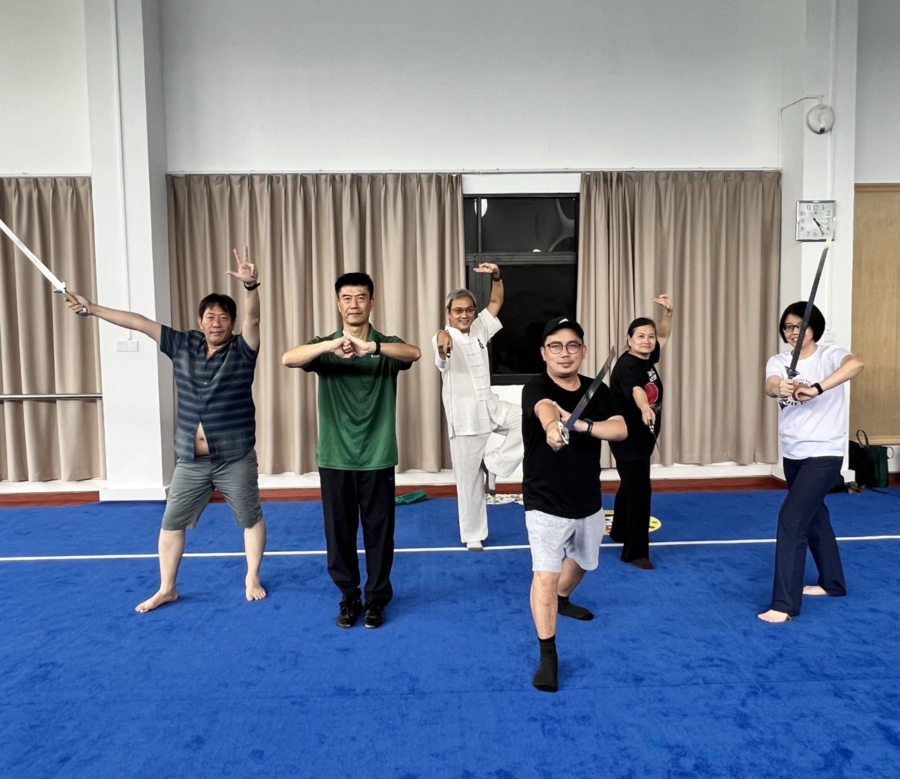 Ateneo Confucius Institute Teacher training participants practicing Wushu with Associate Prof Li Peng from the SYSU Department of Physical Education.