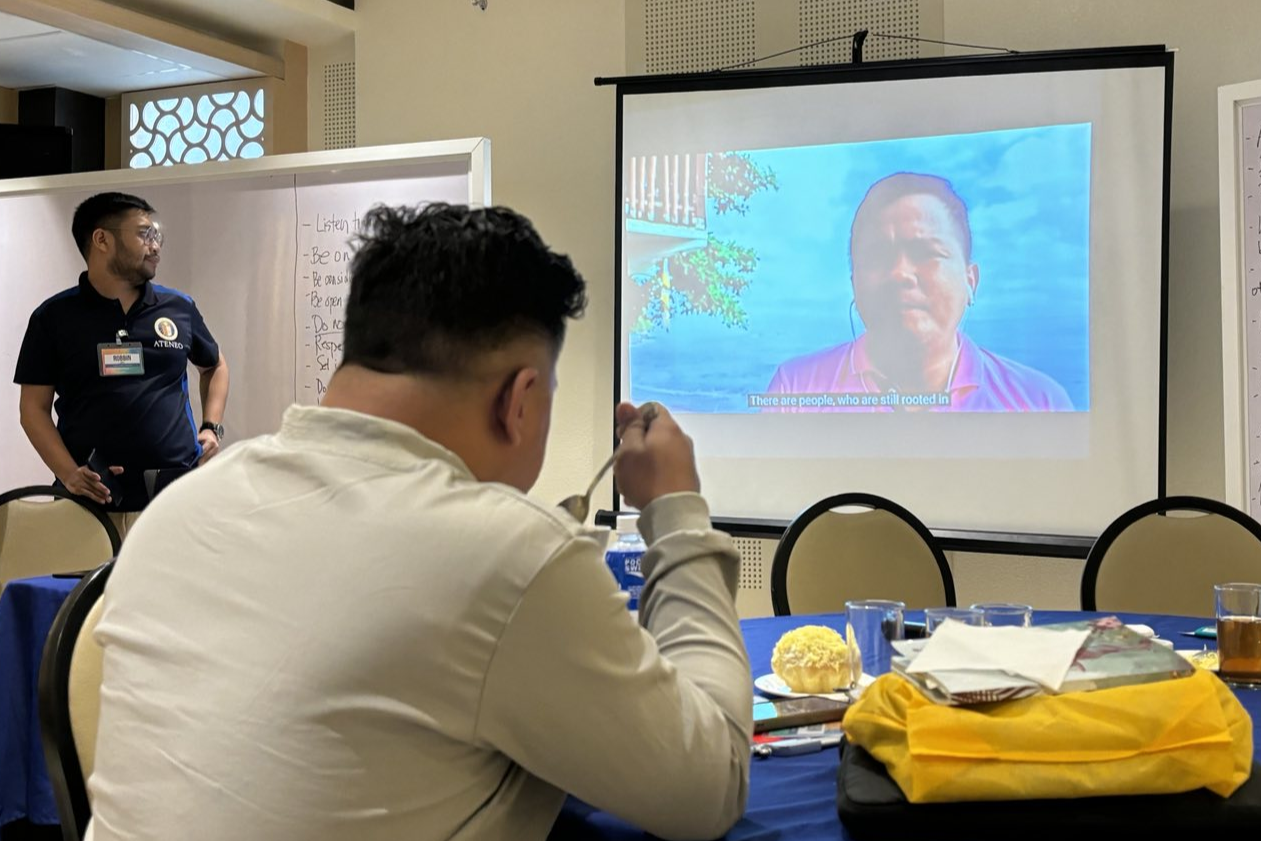 Workshop participants listen to videos from fellow local faith actors in Burundi and Sri Lanka.