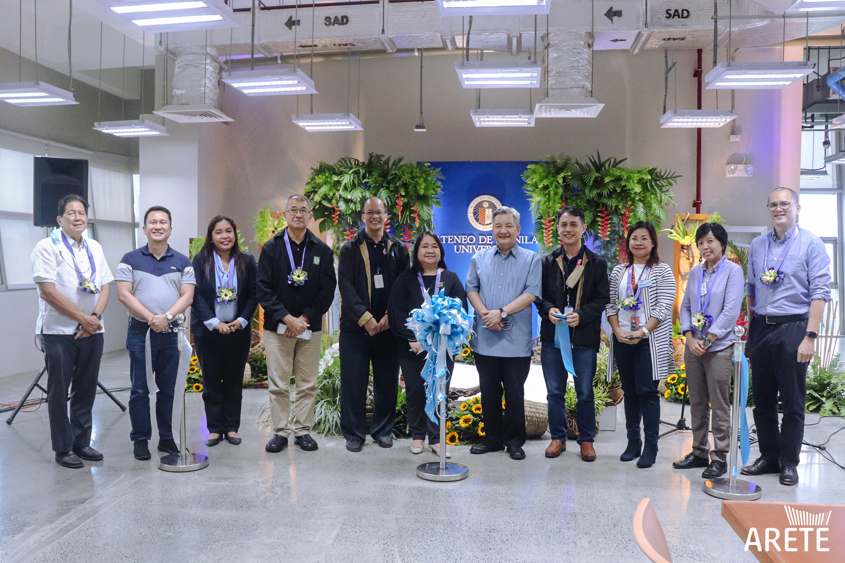 blue nest ribbon cutting