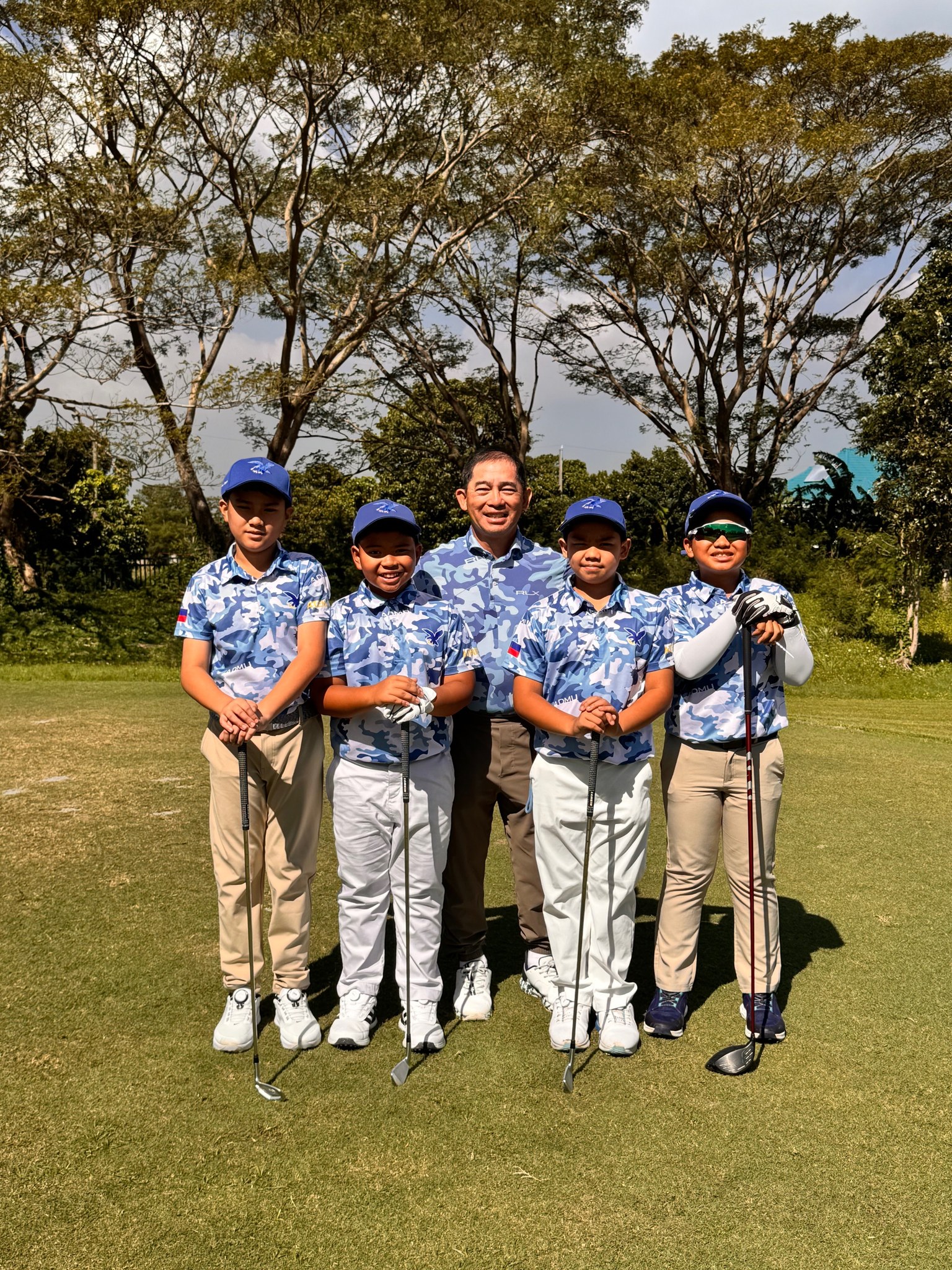 (L-R) EC Aguirre, Luis Espinosa, Coach Jong Castañeda, Ross Tecson, Race Manhit