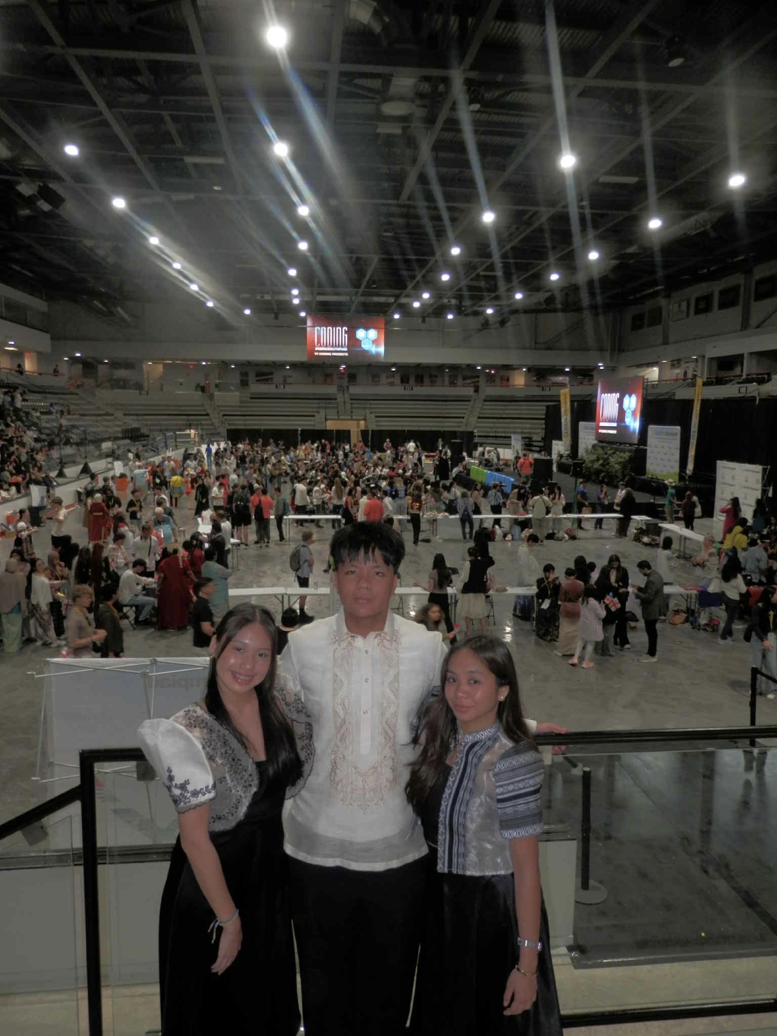 1.	(L-R) Andy Santos, LJ Edrozo, and Miel Nabuab at the Genius Olympiad’s International Fair