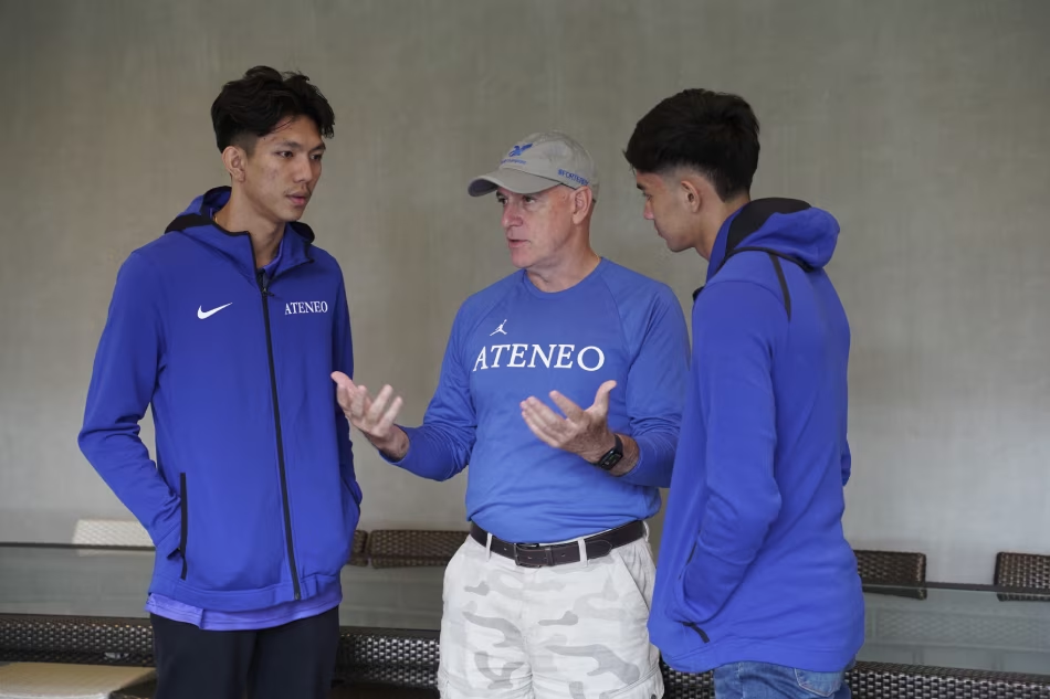Coach Tab Baldwin with the Raffy Celis and Michael Asoro