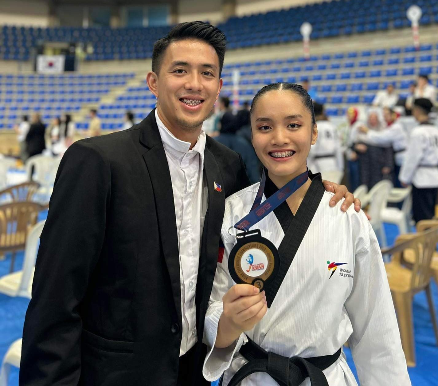 Coach Jeordan Dominguez and Elizabeth Borres