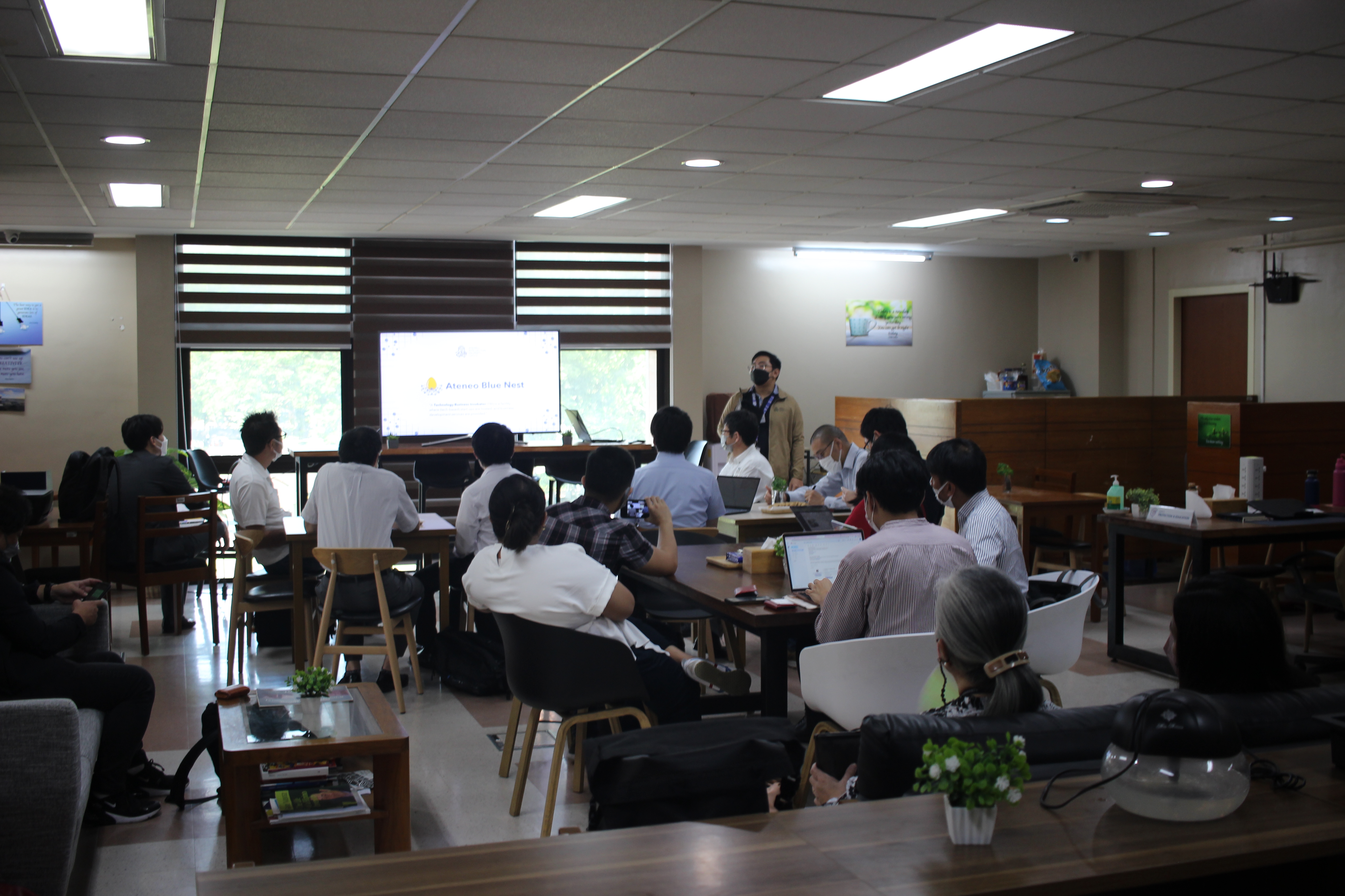 Mr Erfe giving a talk about AIPO