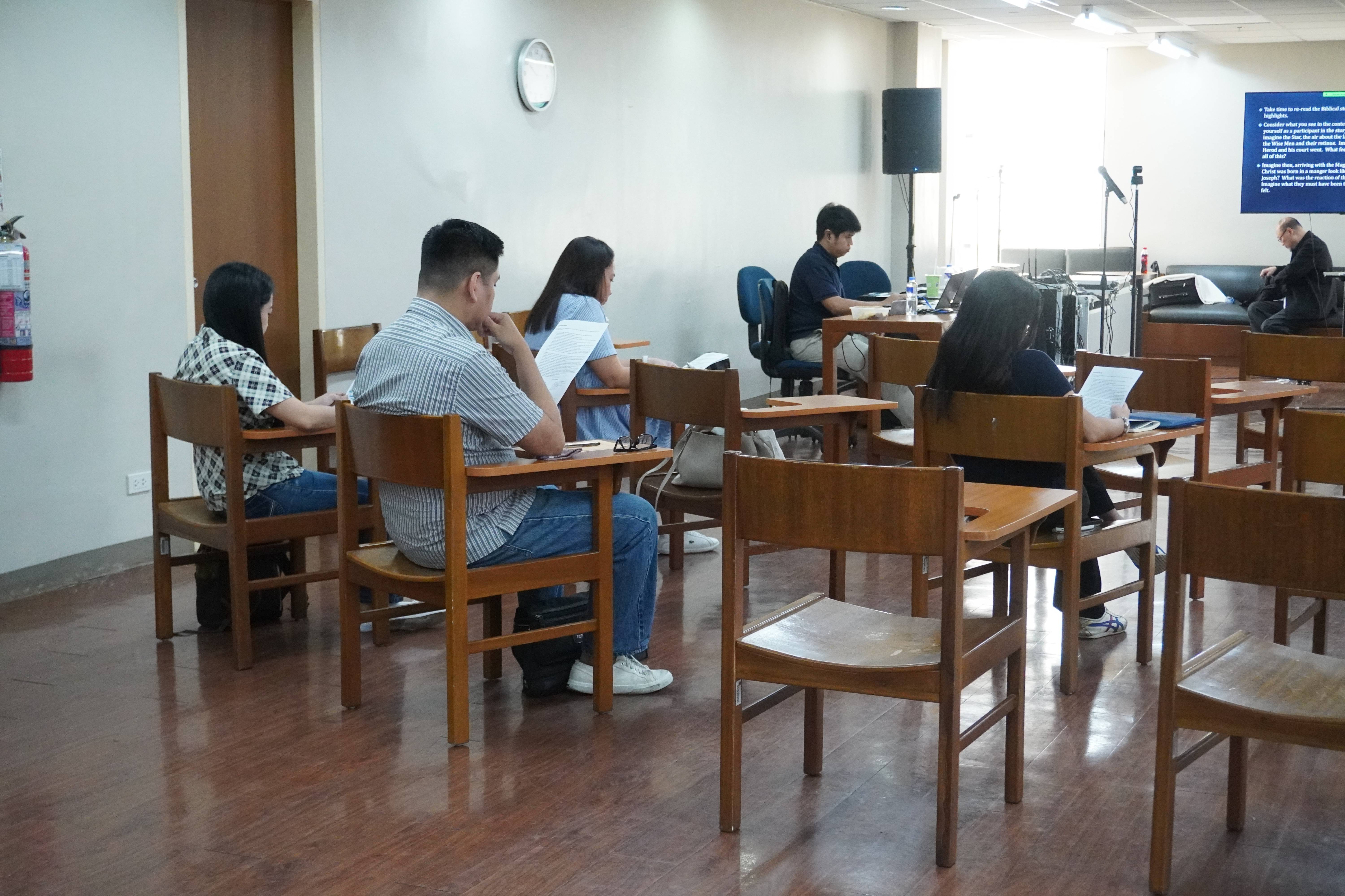The Alumni participants ponder and reflect during the individual prayer period.