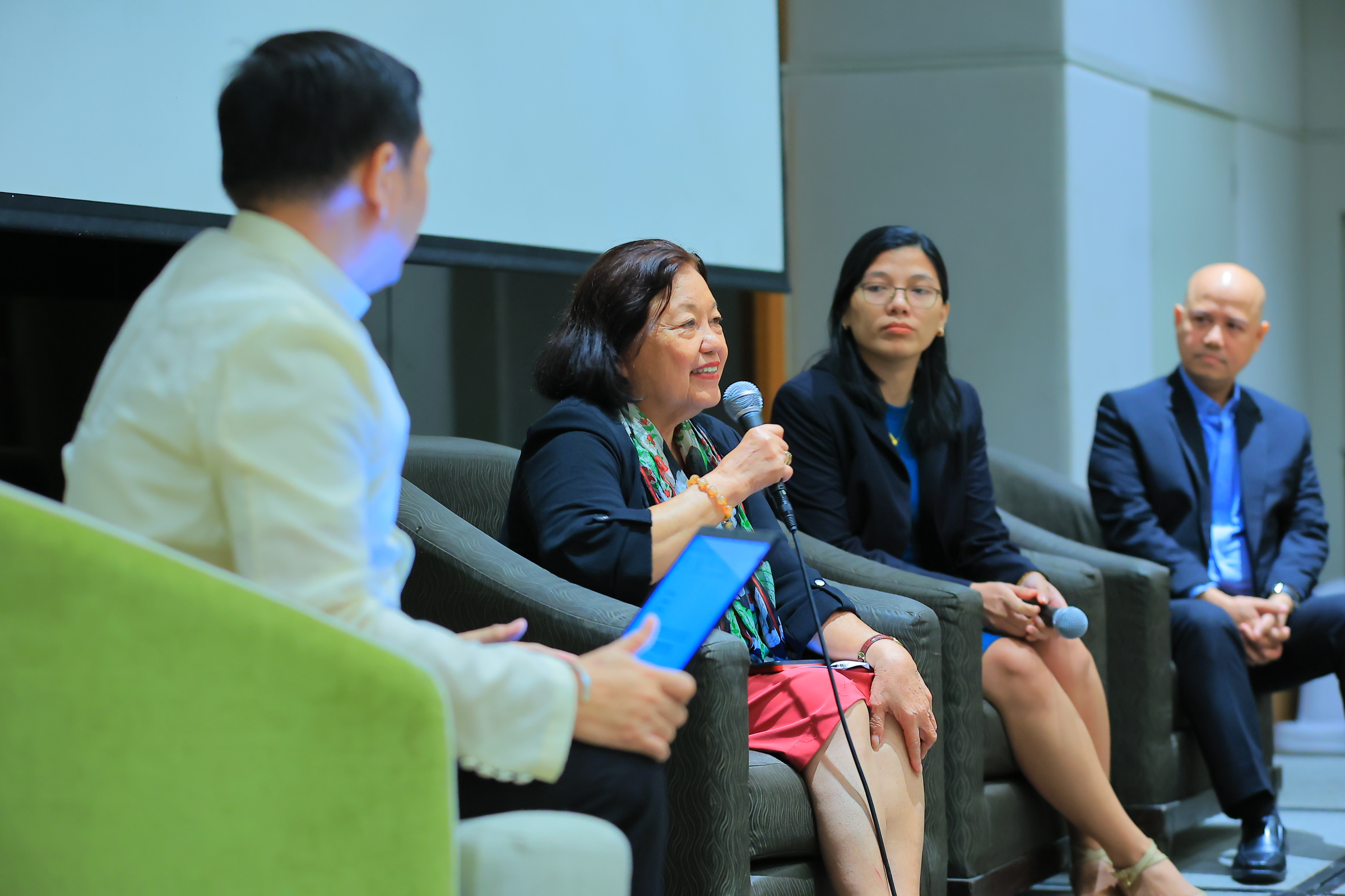 Panelists (left to right) Prof Porio, Dr Minimo, and Architect Tejada during the open forum.