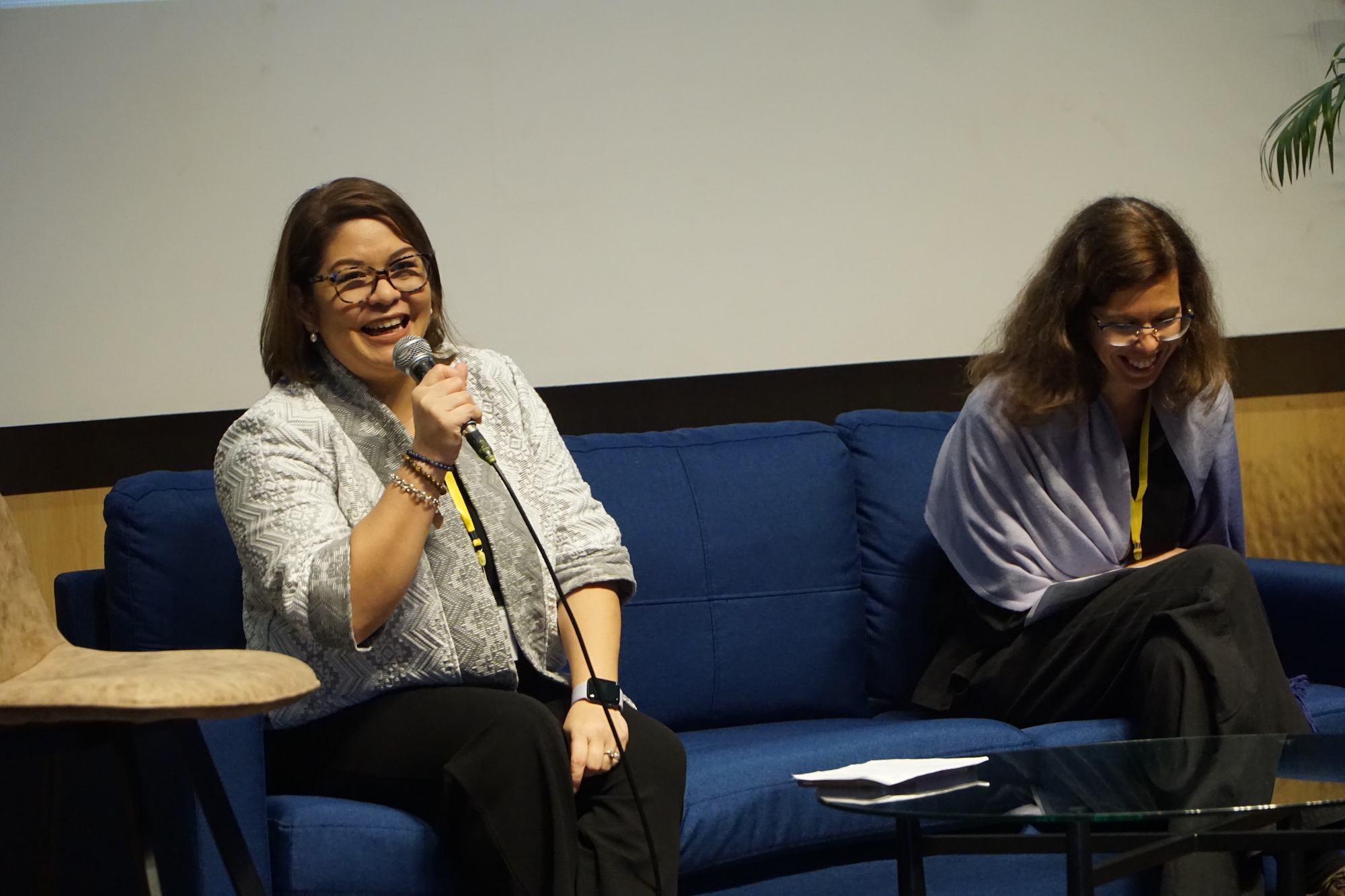 Ms Ma Cristina M Alikpala sits with Dr Yarosh during the Q&A discussion