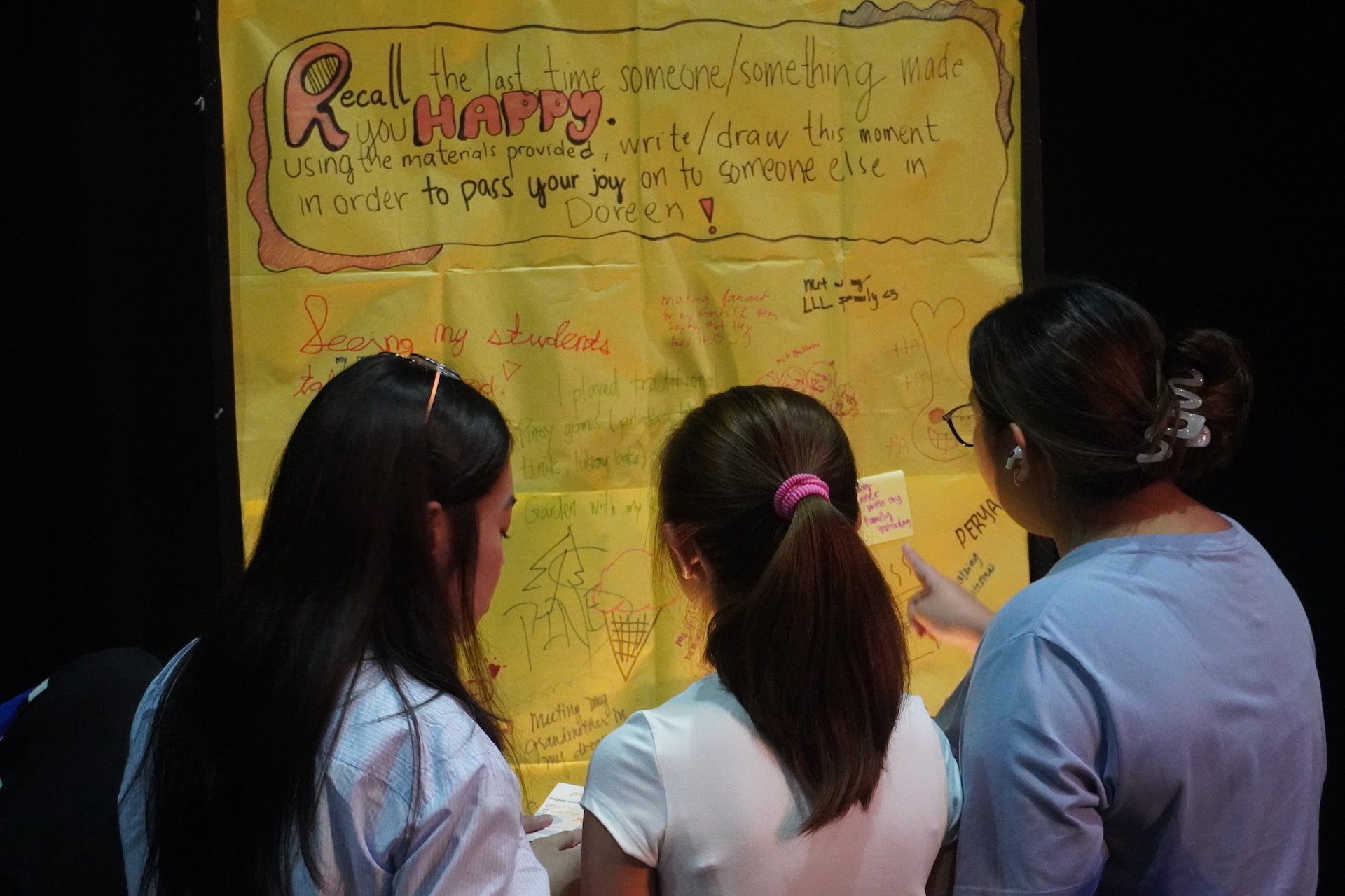 Students interacting with the exhibitions