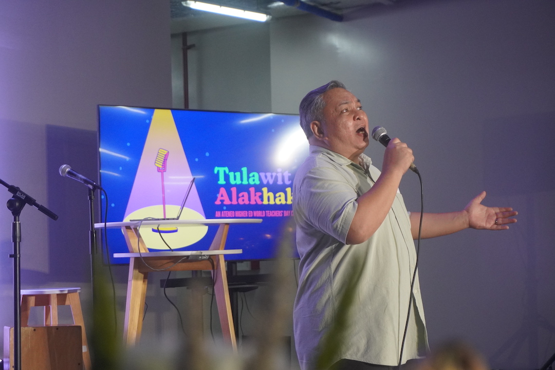 Mike Coroza wows the audience with his own poem and sings a Filipino classic.