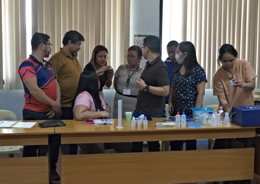 Photo: Mr. George Quitoriano and Ms. Mariela Alcaparas of AIPO presenting the Lab-in-a-box to the faculties of Xavier University