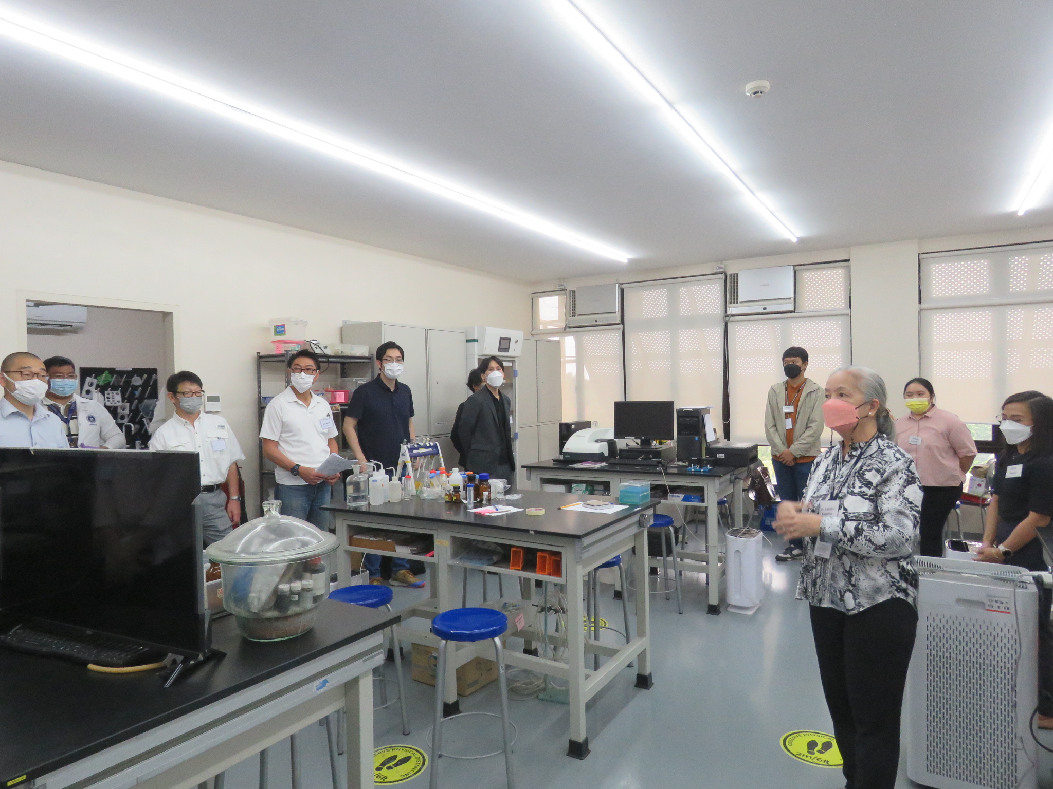 Dr Espiritu giving a tour of the labs