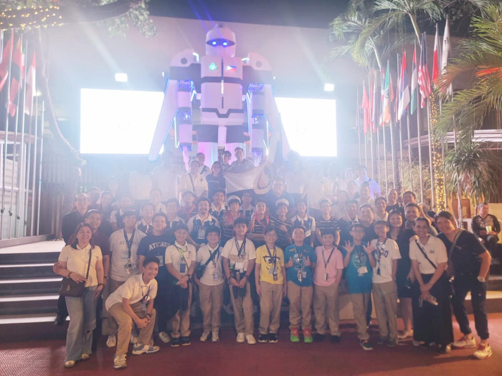 Family photo of Ateneo de Manila's AGS and AJHS reps at the 14th First LEGO League Philippines competition in DYCI.