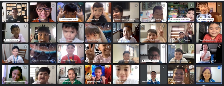 Grade 1 boys interacting virtually with personnel from the Philippine Animal Welfare Society