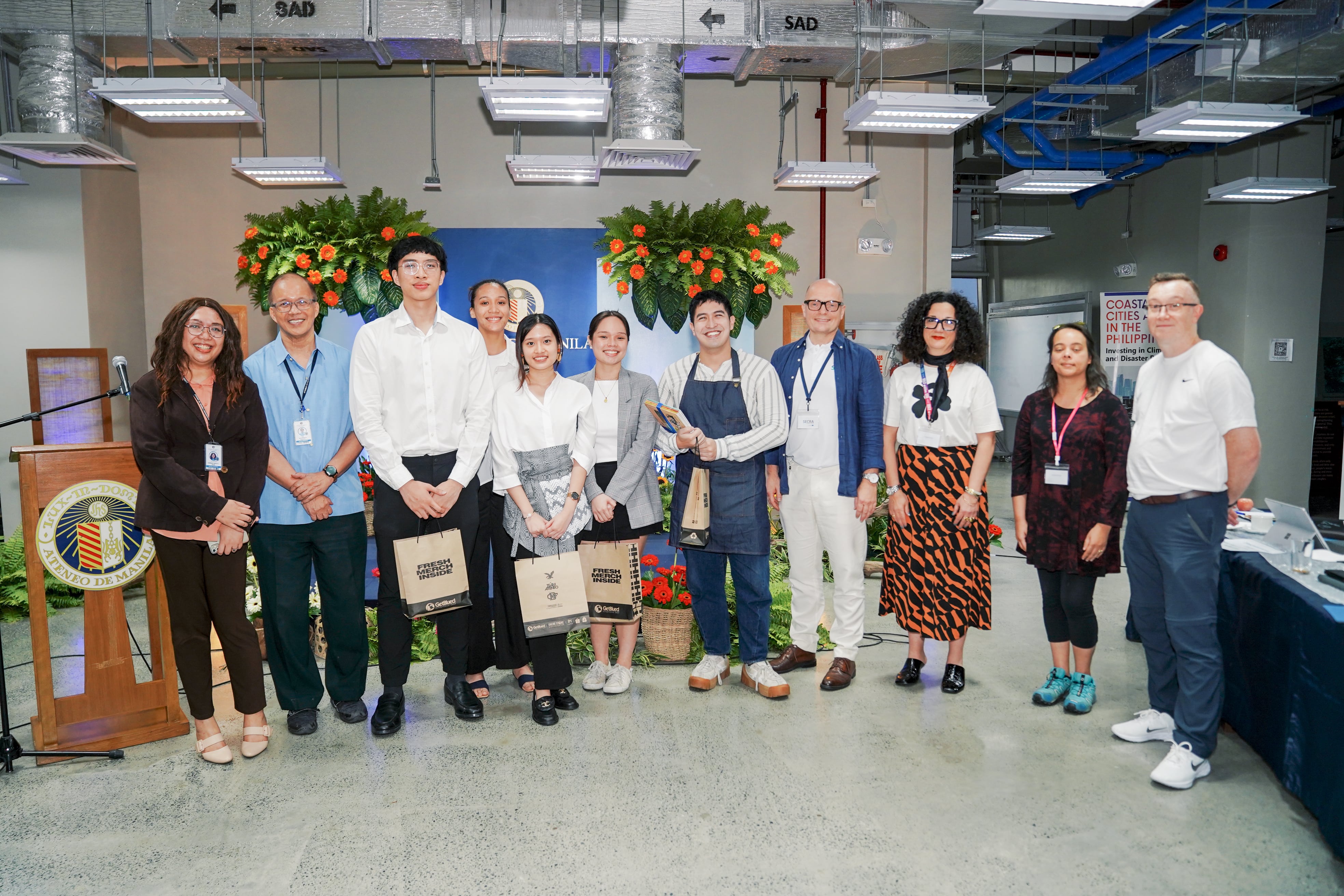 The winning student group, EcoEats, with the judges and their instructor, Ms Atun.