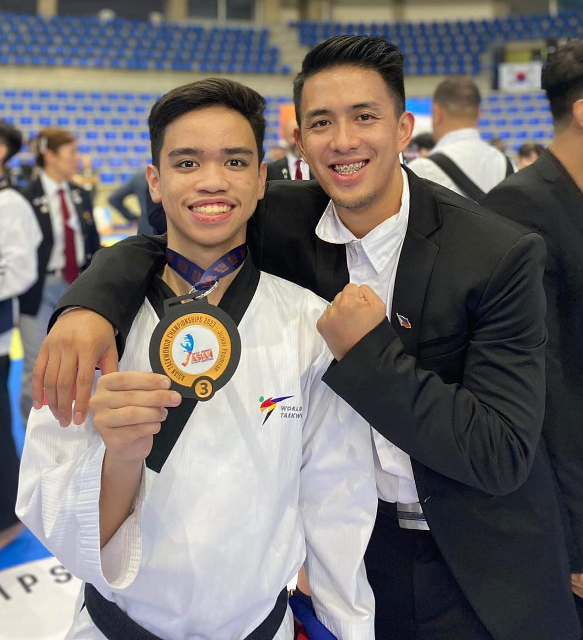 Lucas Llarena with coach Jeordan Dominguez