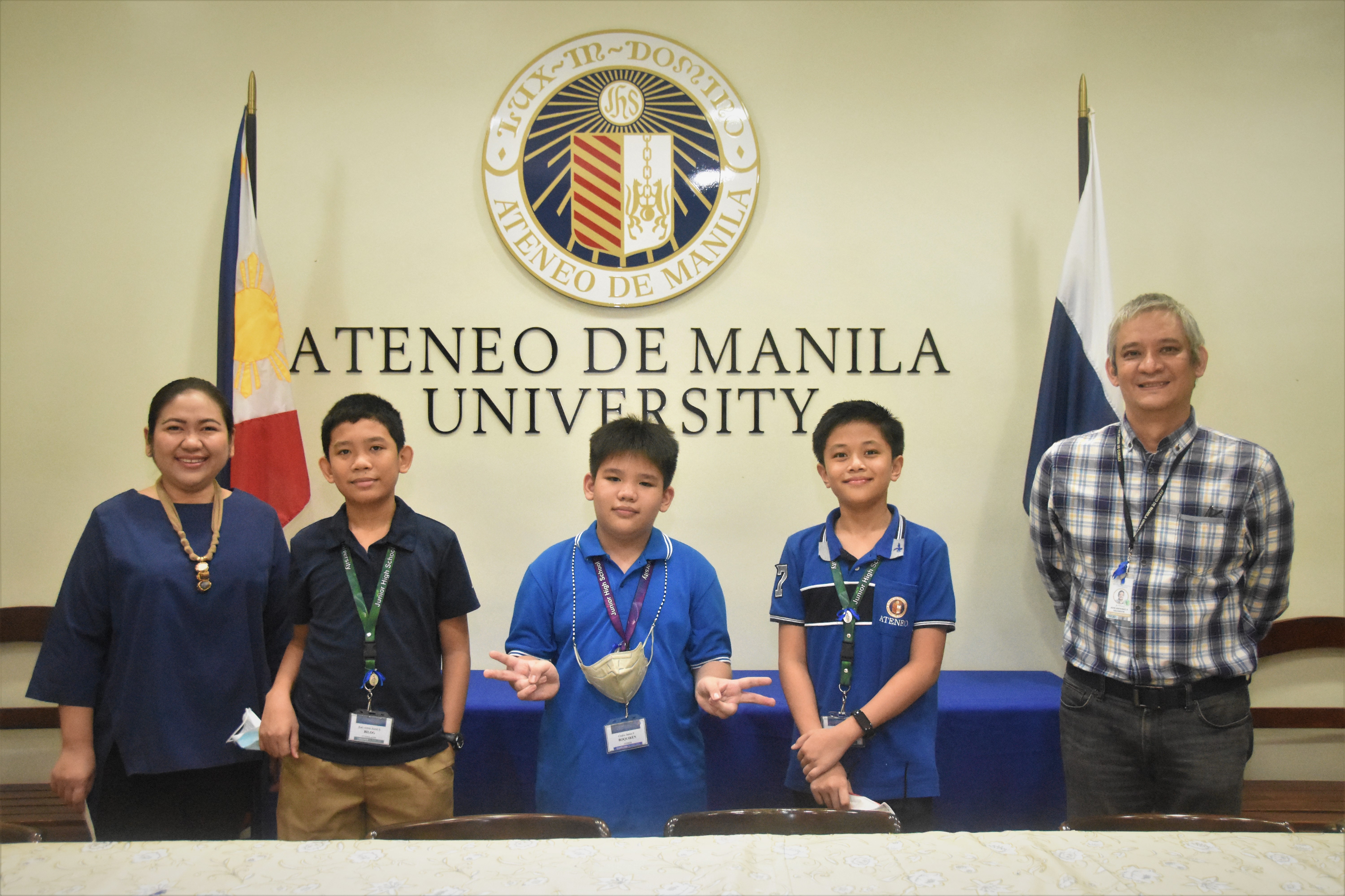 (L-R) AJHS Assistant Principal for Academics Genalyn Sanvictores, Karl Bilog, CJ Boquiren, Thade Go, AJHS Principal Jonny Salvador 
