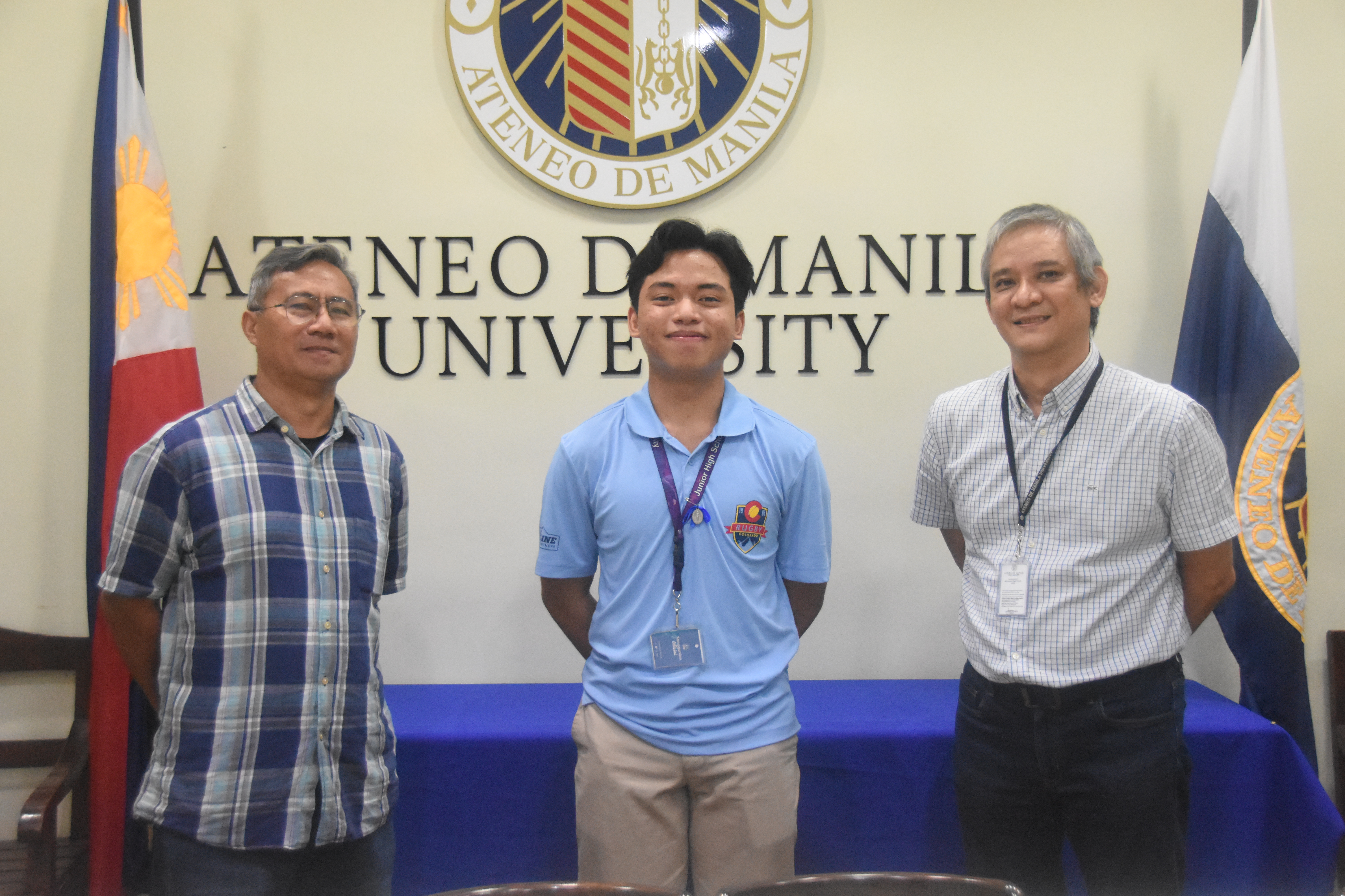 (L-R) AJHS Athletics Coordinator Raul Albarece, Alonzo Pasion, AJHS Principal Jonny Salvador