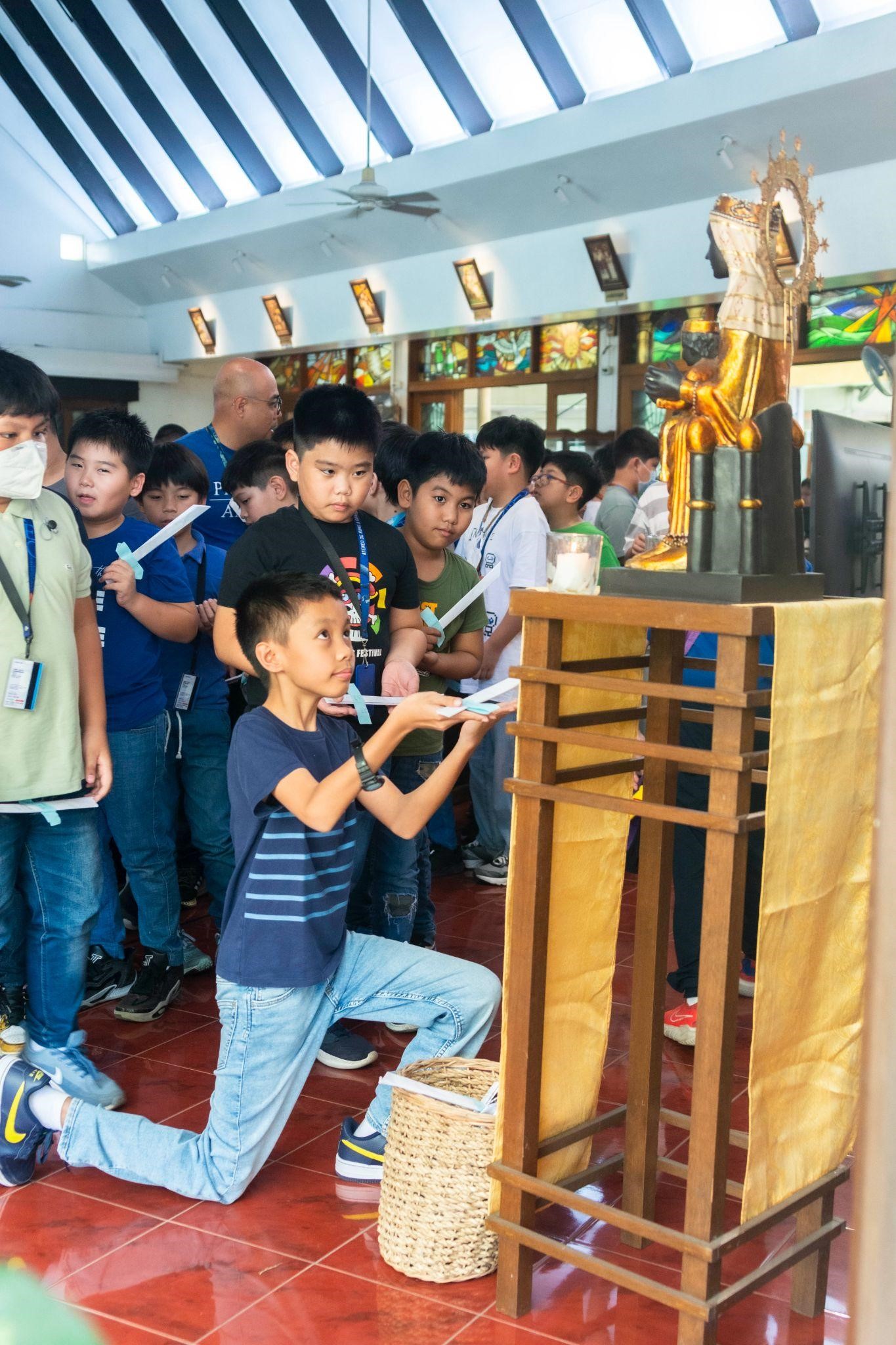 A grade 4 Atenean re-enacts a pivotal moment from St Ignatius' life