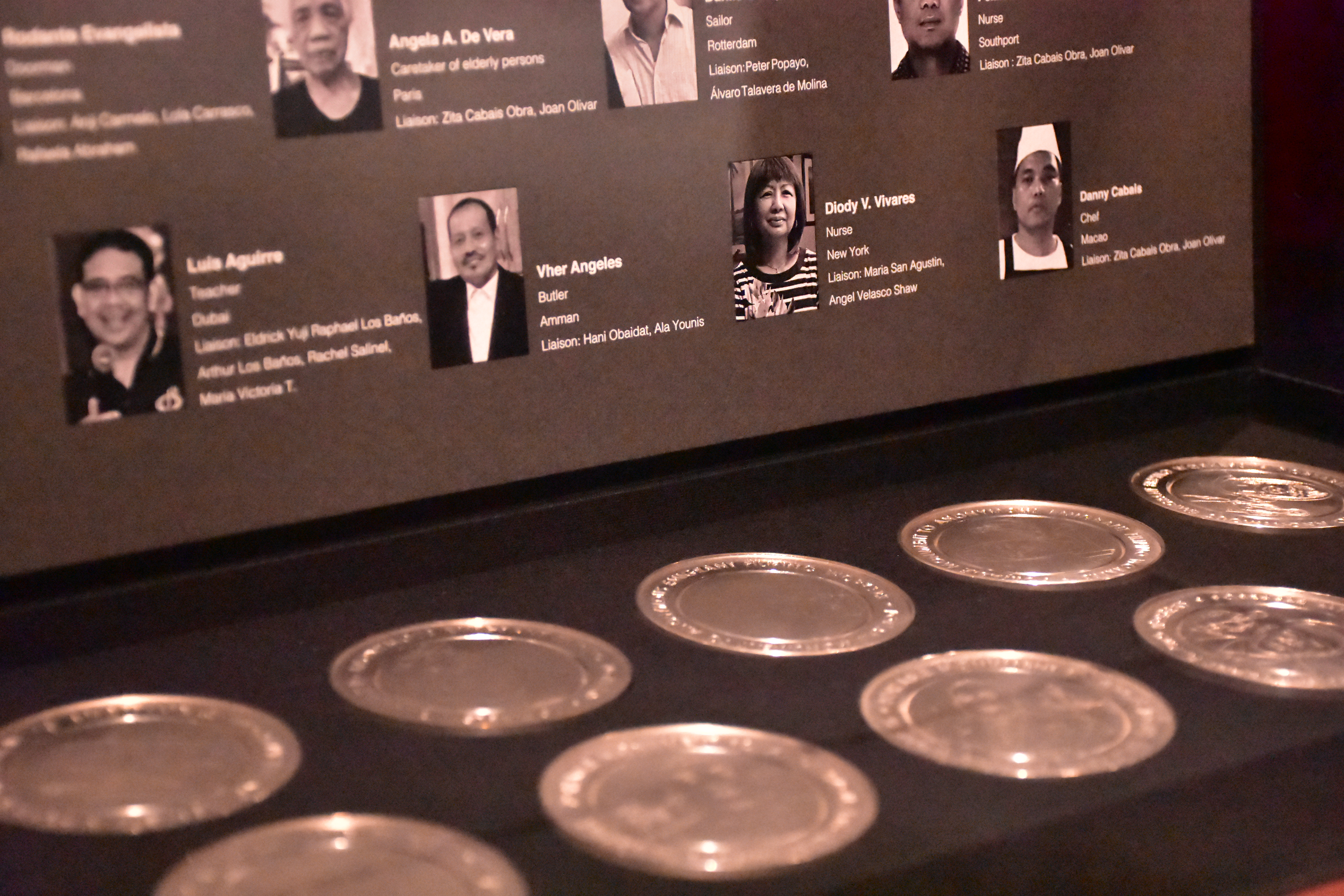 Detail shot of "Portable Monuments to Anonymous Emigrant Filipino Workers" from Muntadas: Exercises on Past and Present Memories at Ateneo Art Gallery (2021 iteration). Photo by Clefvan Pornela.