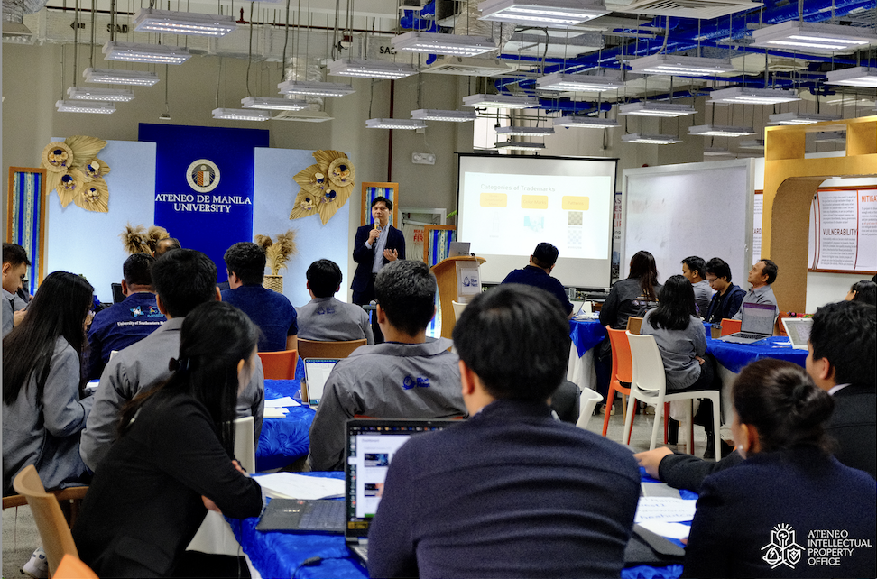 Image: Engr Kevin Facun discussing the different categories of a Trademark with STEP participants