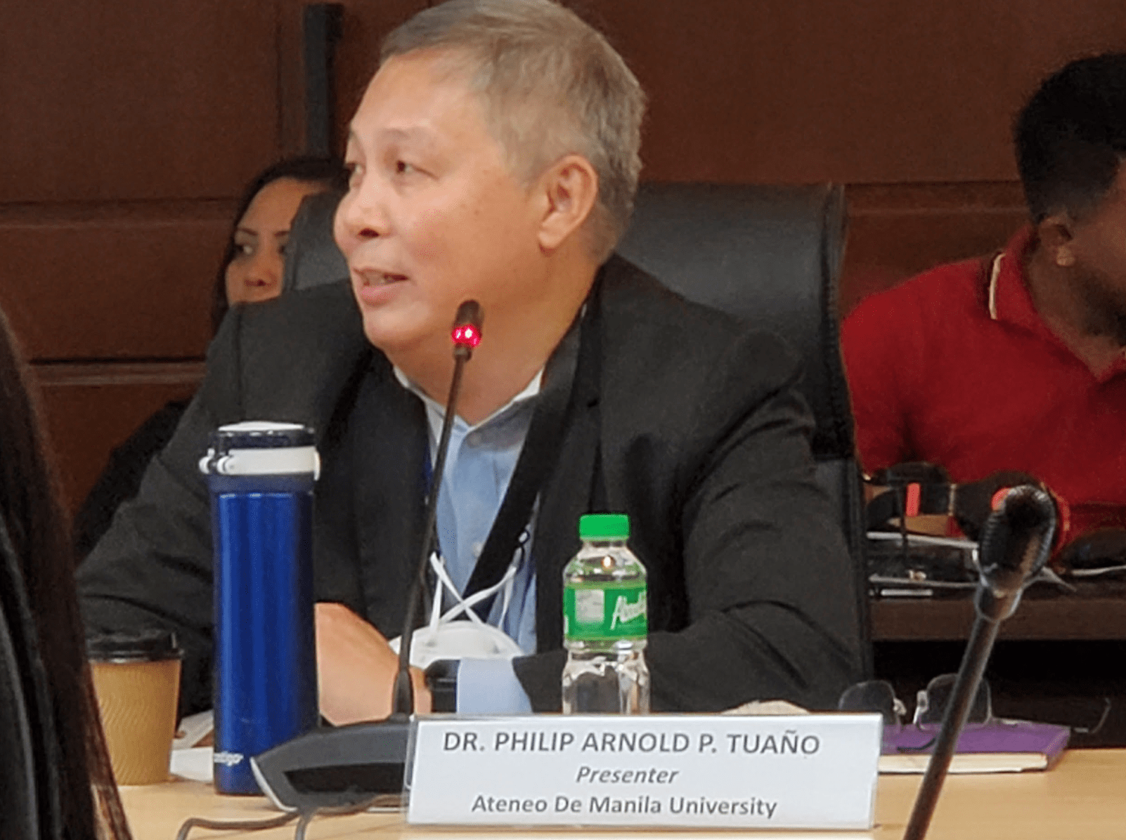 Dr. Philip Tuaño and Prof. Joselito Sescon, HRep-Ateneo Congressional Research Fellows, presenting their team’s research on labor