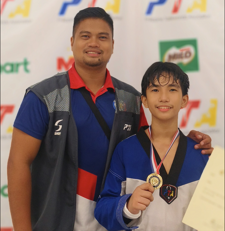 Coach Lito Laga and gold medalist Koko Capiral