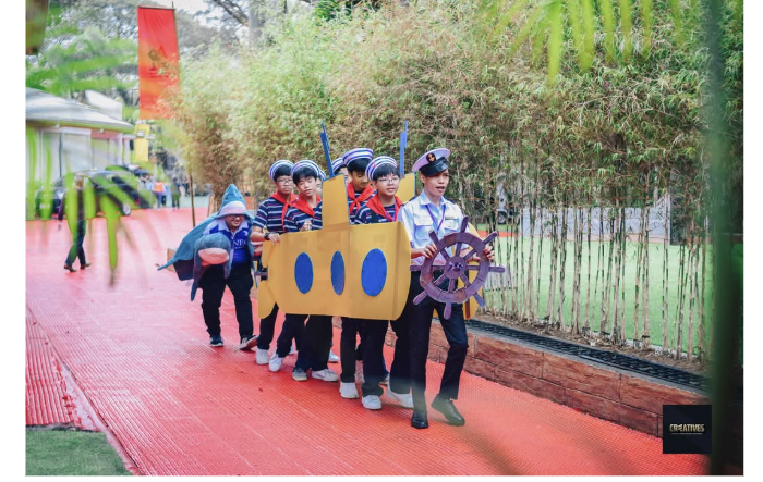 BluBLOC FLL Team in a yellow submarine costume during the schools’ march. From left: Mr. Arias, Matty Trinidad, Ethan Hizon, Nathan Ballatan, Marc Tiongson, Hanns Bumatay (photo from Felta)