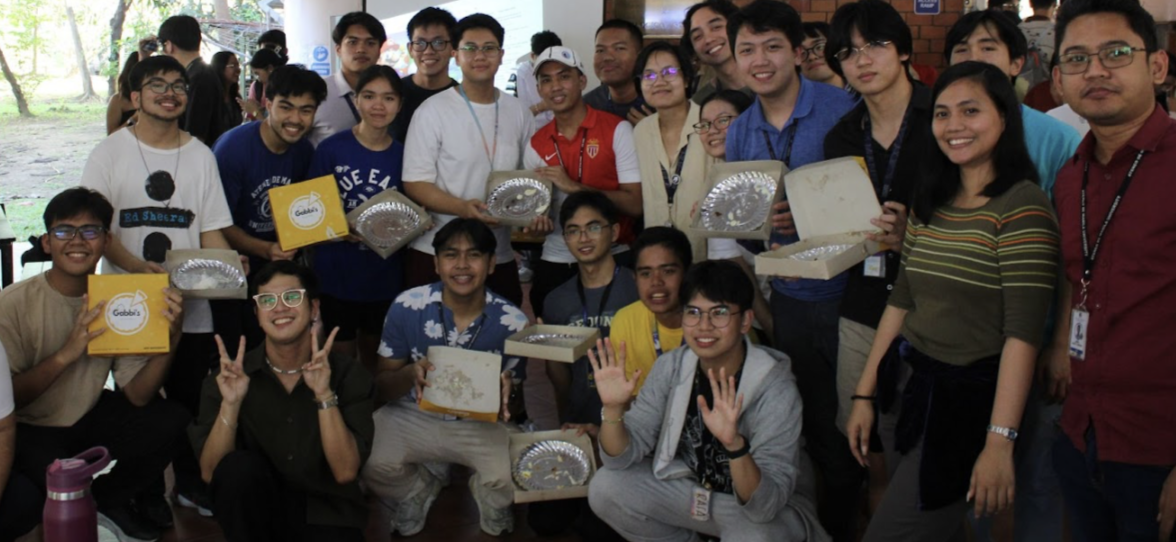 Teams and their finished pies after the competition