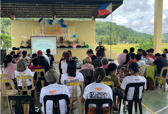 Community members listening attentively and participating actively in the workshop