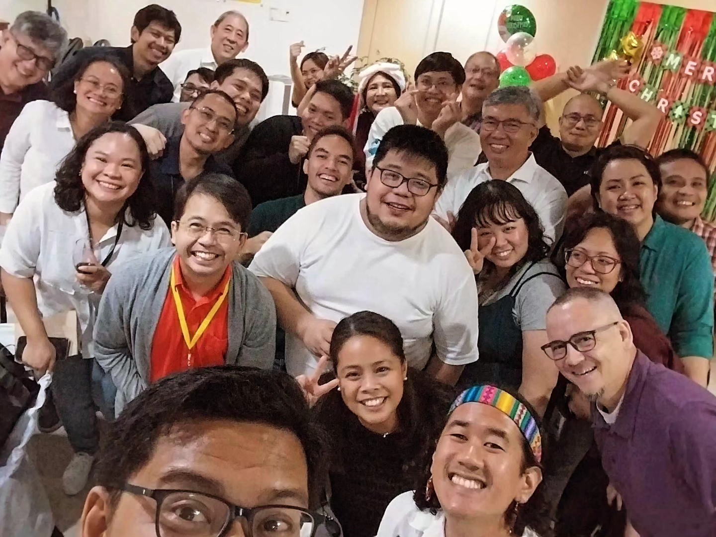 Trish with colleagues and friends at the Theology Department Christmas party last year, 2023. Photo courtesy of Trish Lambino/Credit to John Paul Bolano