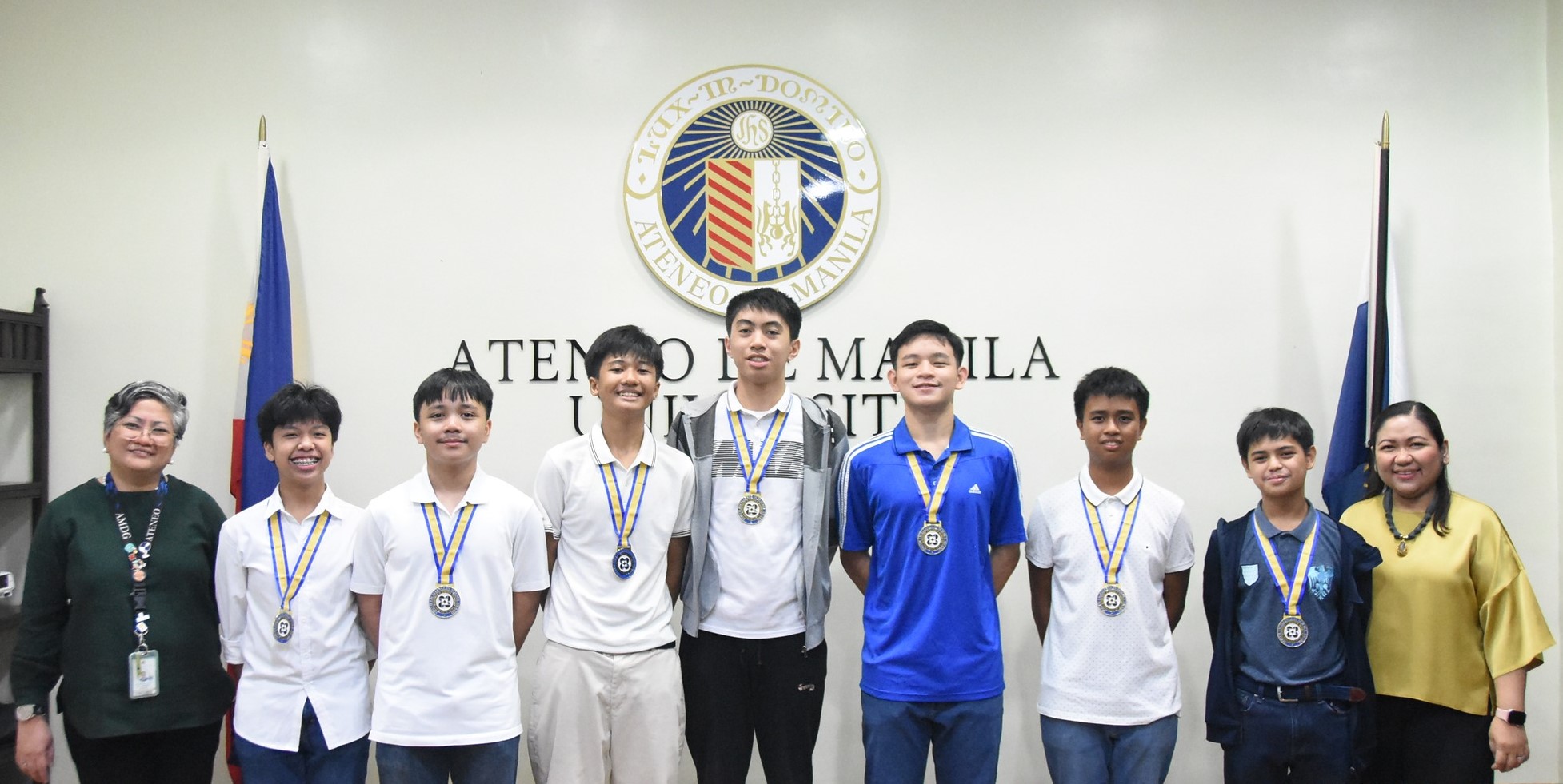 From left: Malou Antonio (Assistant Principal for Academics), Fonz Bautista, Joaquin Jobog, Nathan Ballatan, Aegean Nakila, G.O. Gumban, Gerrico Argonza, Miggy Dugan, Gen Sanvictores (AJHS Principal)