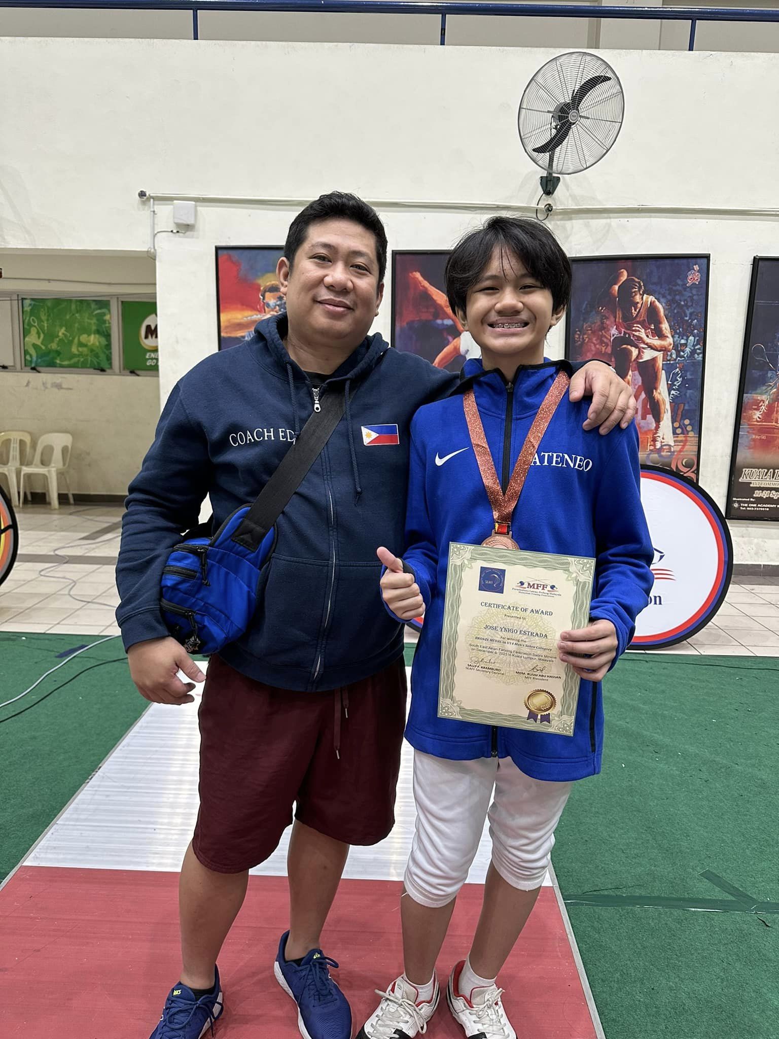 Coach Edward Daliva and Yñigo Estrada