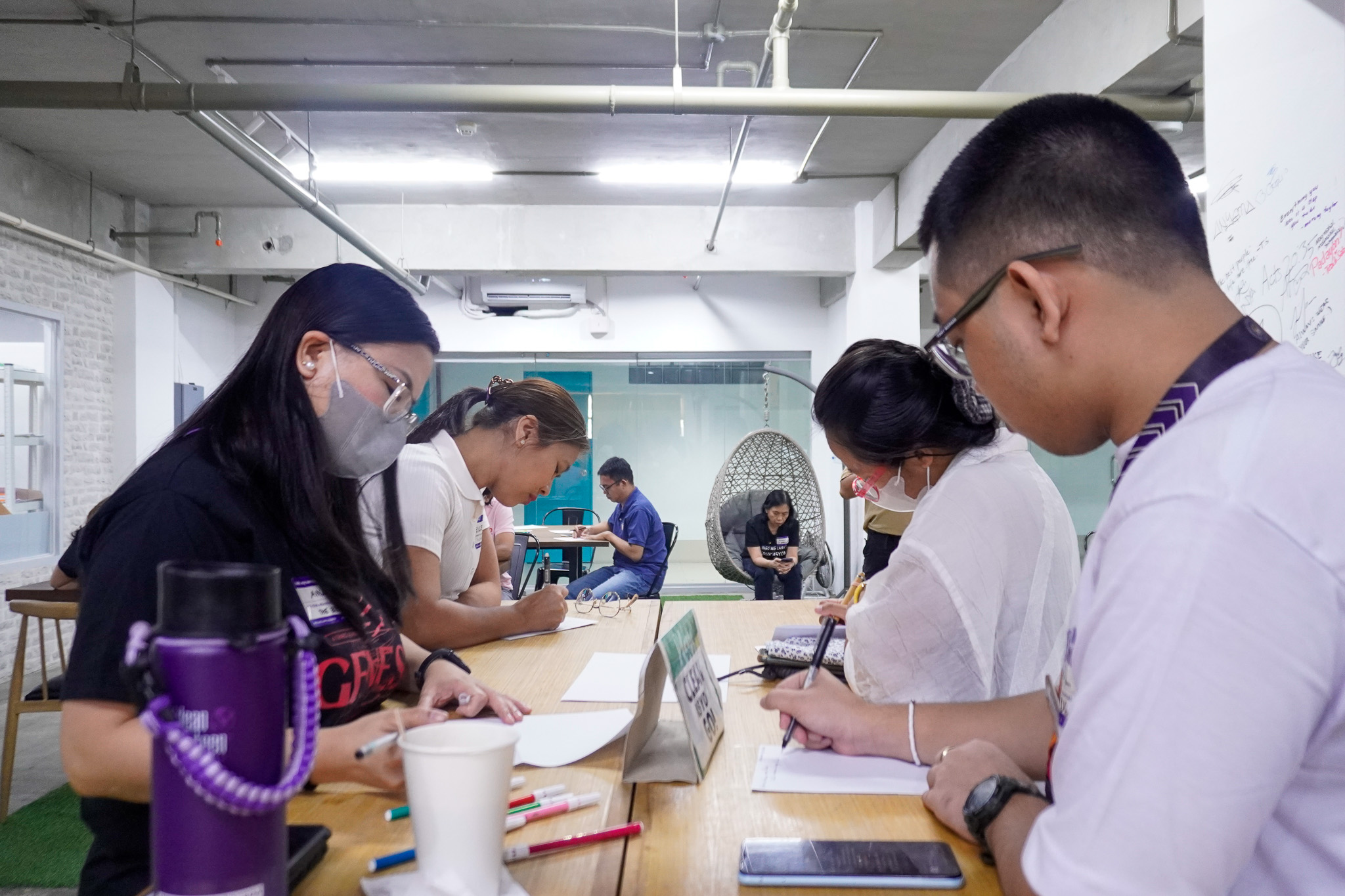 Participants writing