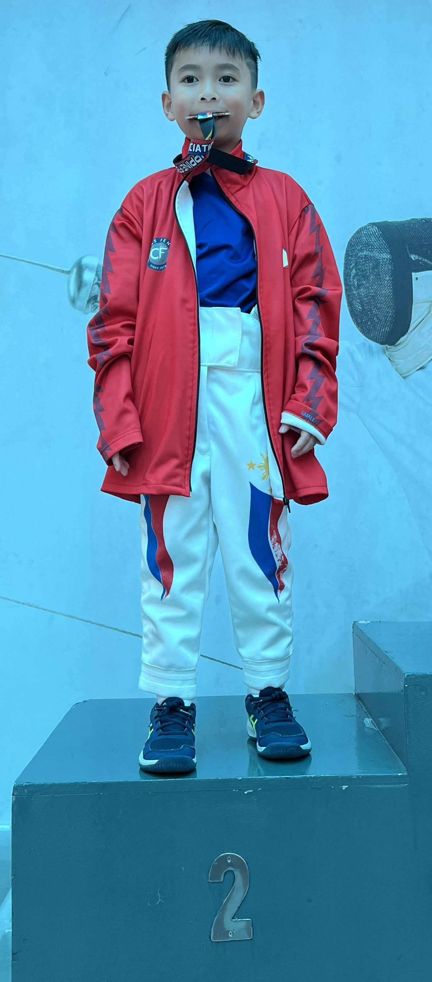 Roman Almiranez with his silver medal 