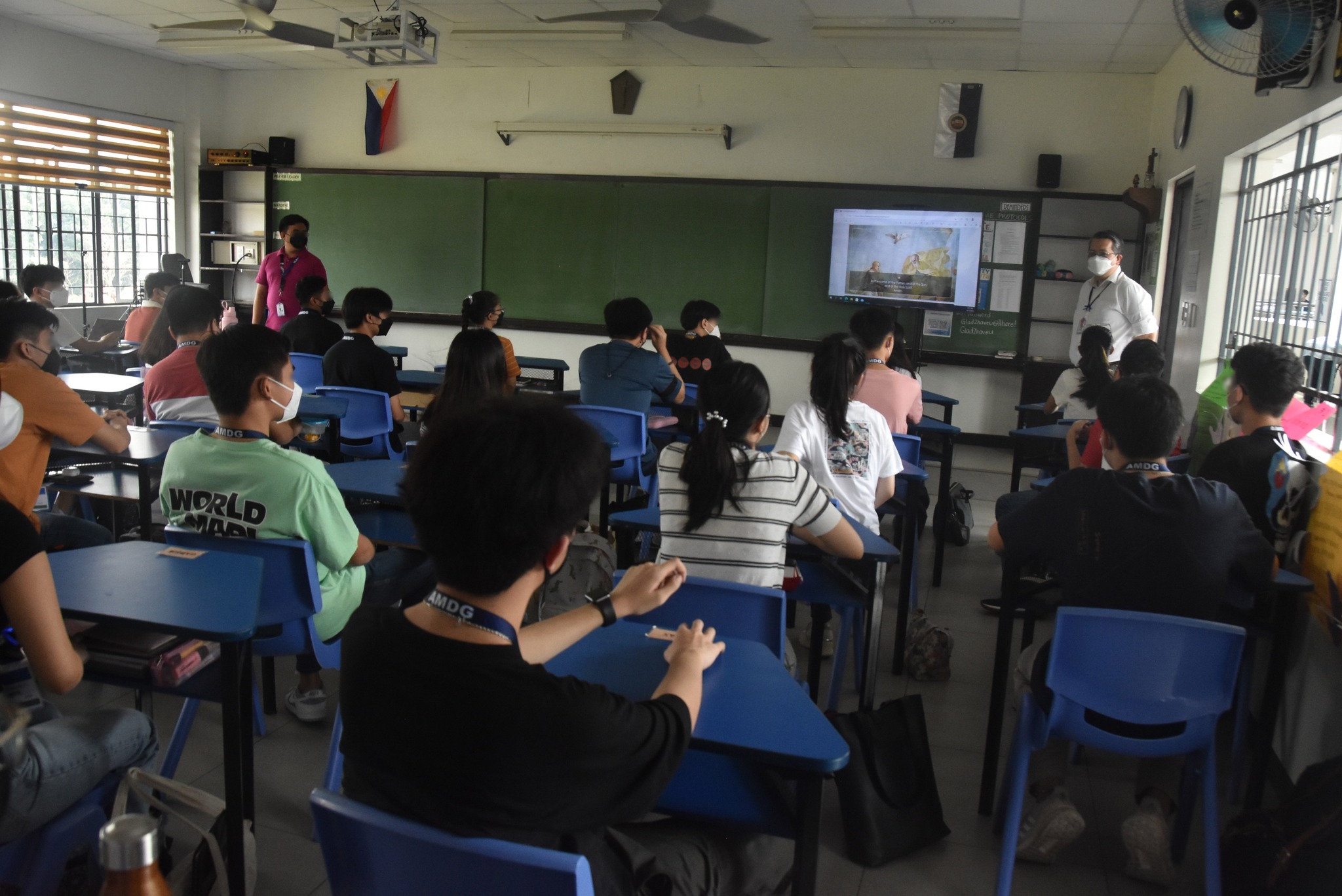 ASHS Principal Noel Miranda (right) says hello