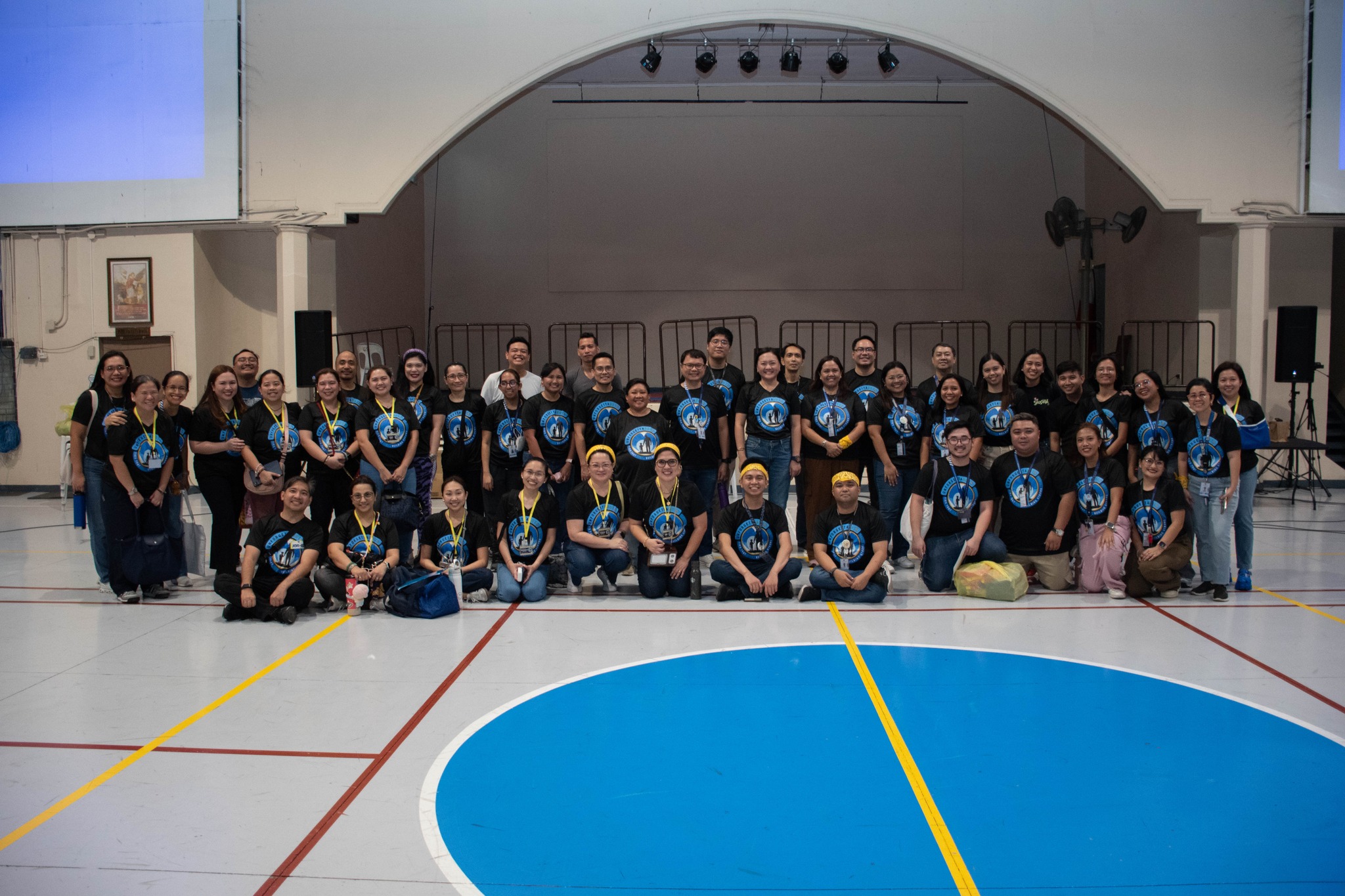 The Grade 5 teachers and Class Parent Representatives (CPRs) showing their joyful smiles after the successful Boys Bonding Night