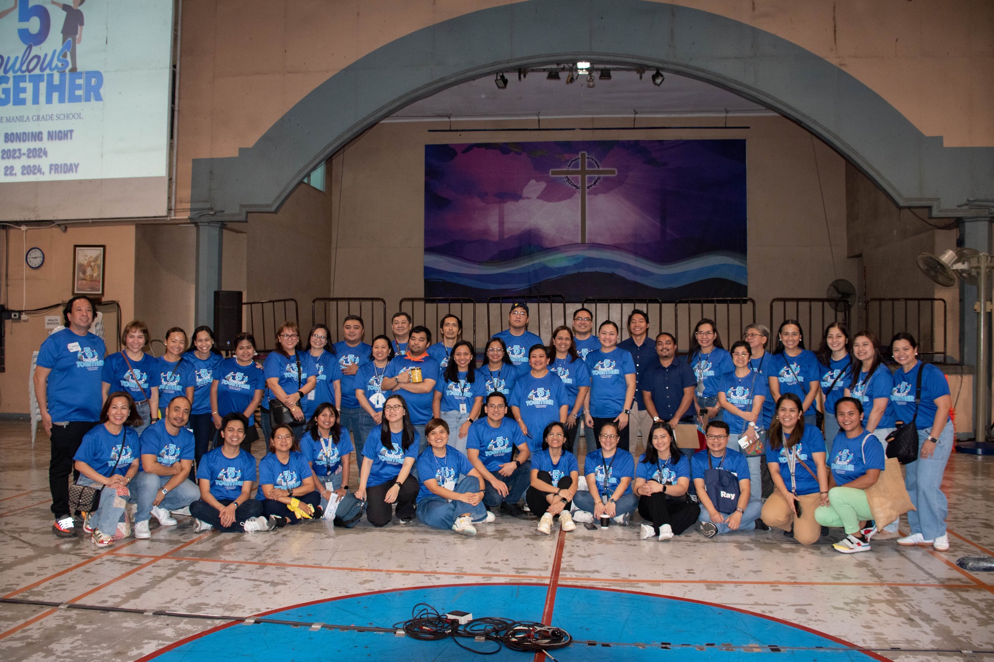 Grade 5 teachers and CPRs with celebratory smiles after a successful Boys’ Bonding Night