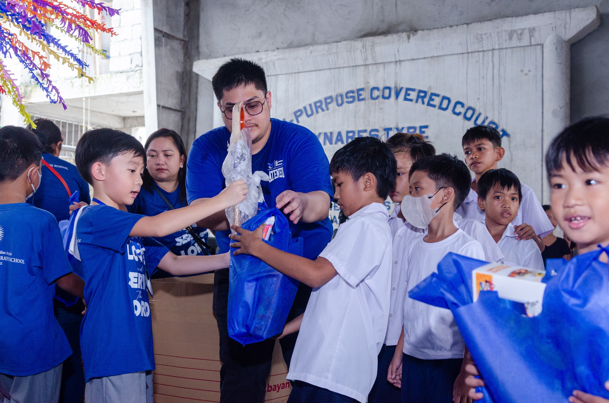 Grade 3 students sharing Christmas blessings with their Bigay Puso friends