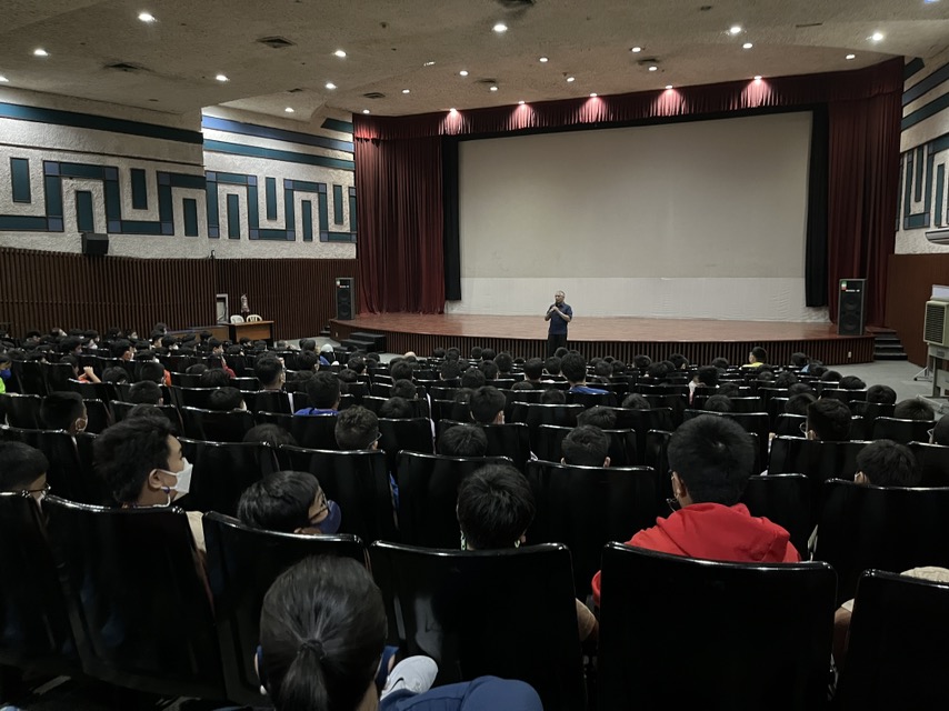 The boys listen to the talk of a WWII veteran's son