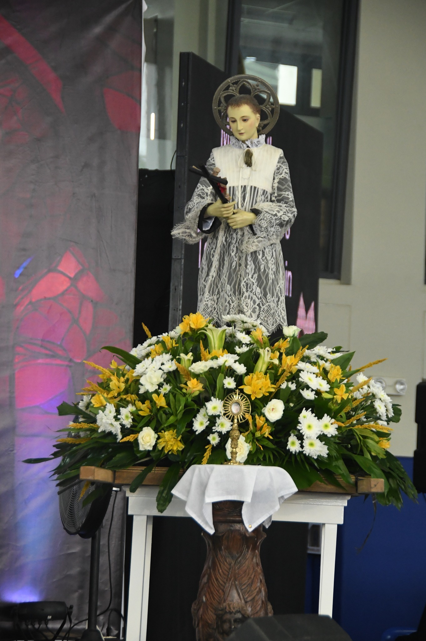 First class relic of St Aloysius Gonzaga at the foot of his image in the ASHS' St Gonzaga Feast Day Mass