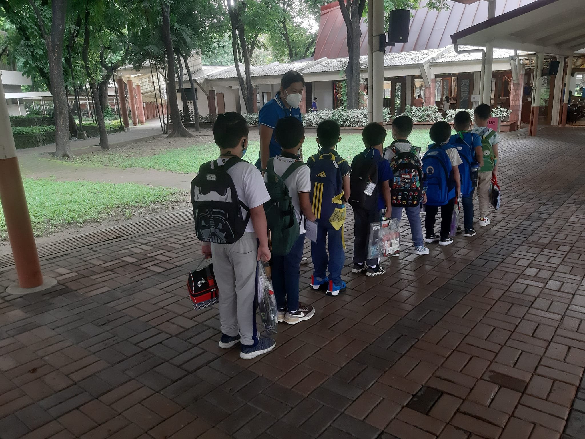 Grade 2 boys about to be led to their classrooms