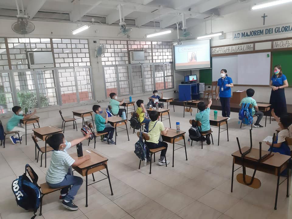 Grade 2 boys answering teacher's question