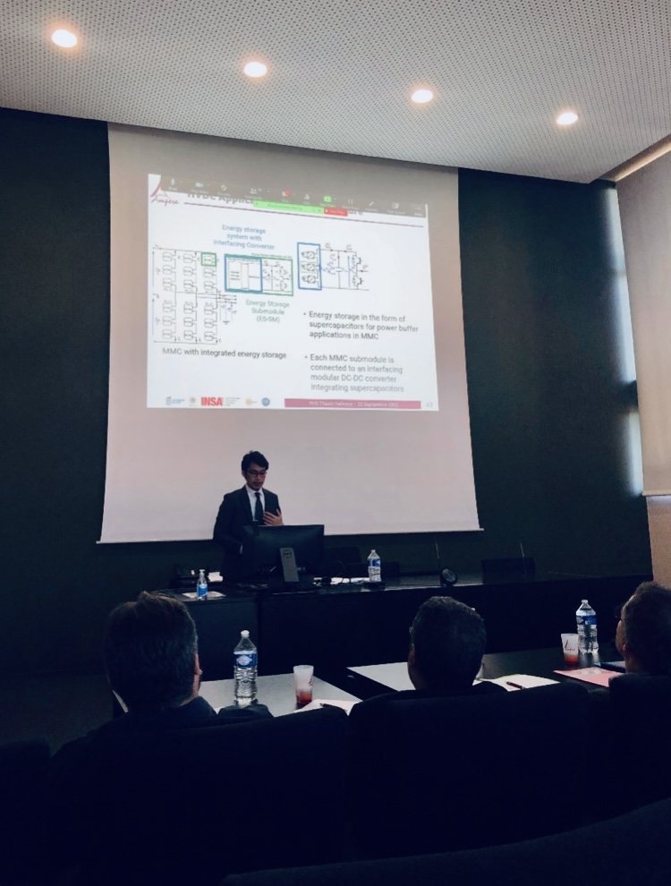 Dr. Peña defending his thesis in French