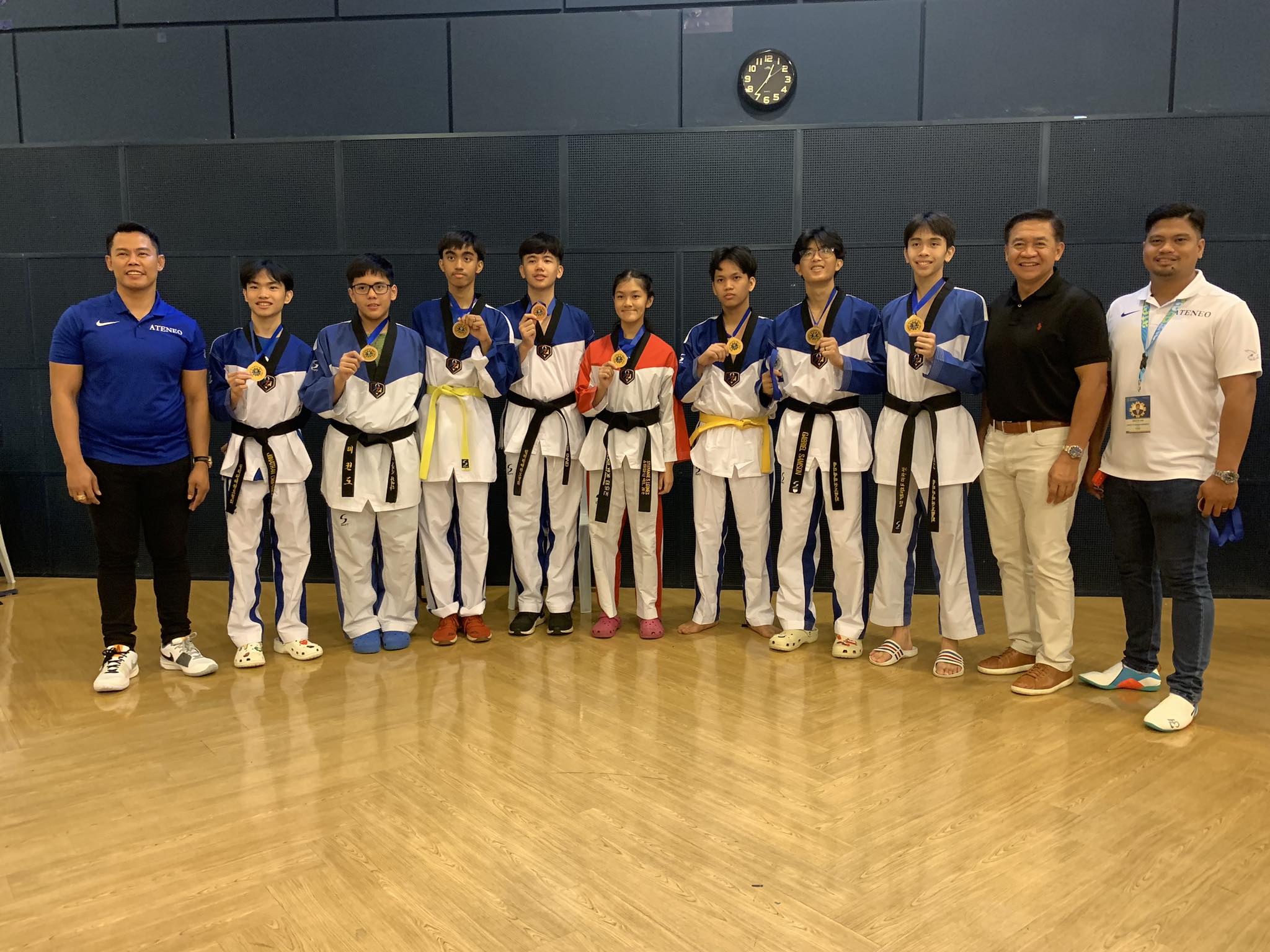 From left: Coach Elmer Rafael, Nathan Chupungco, Max Favila, Jared Gagni, Carlos David, Stefanie Leones, Jacob Rodriguez, Gabe Samson, Niko Macasaet, Ateneo Taekwondo Program Head Jesus Morales, Coach Angelito Laga